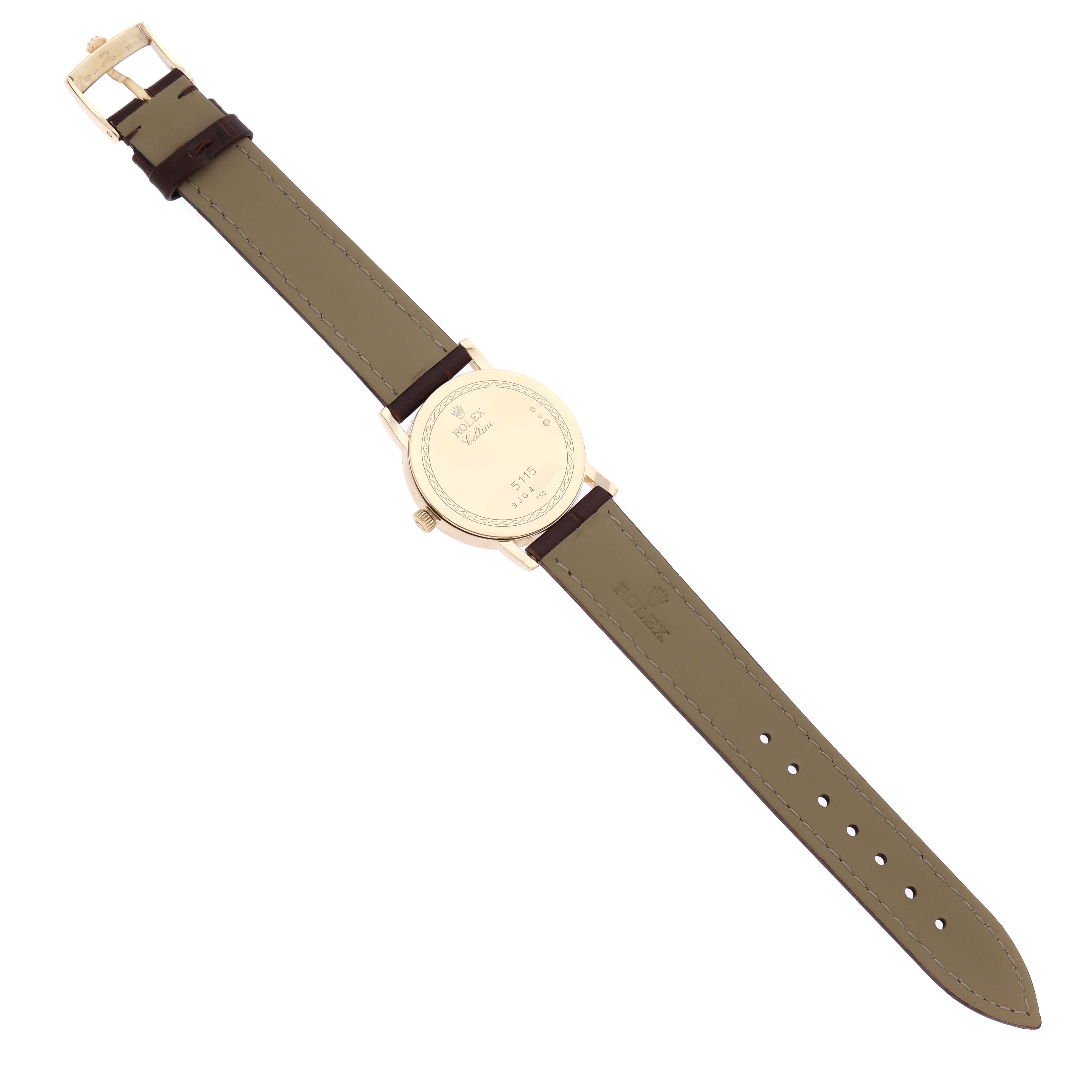 The image shows a Rolex Cellini 5115/8 Men's Yellow Gold White Dial 5115/8 Men's Yellow Gold White Dial watch from the back, displaying its case back, strap, and buckle.