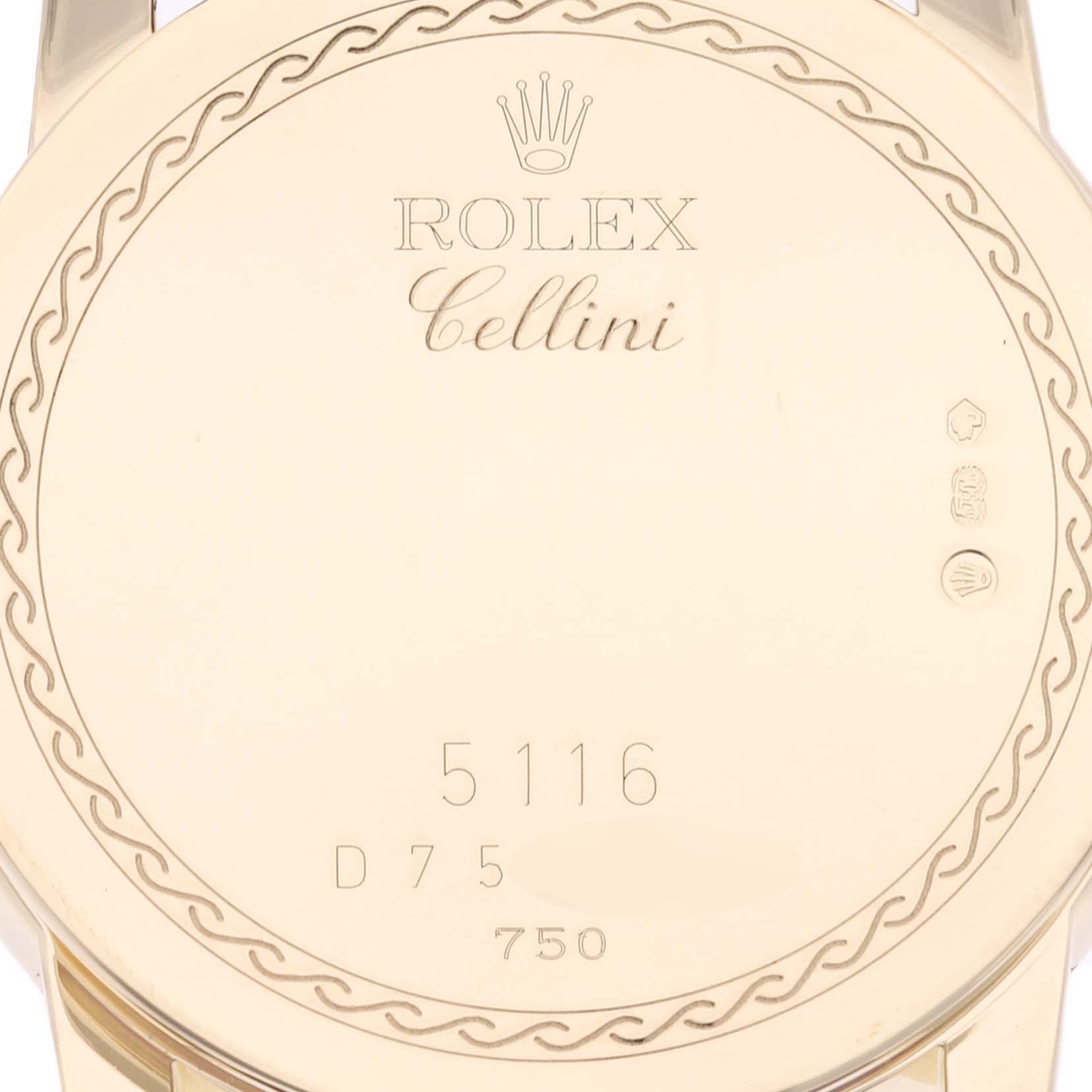 This image shows the back case of a Rolex Cellini 5116/8 Men's Yellow Gold White Dial 5116/8 Men's Yellow Gold White Dial model watch with engravings and hallmarks.