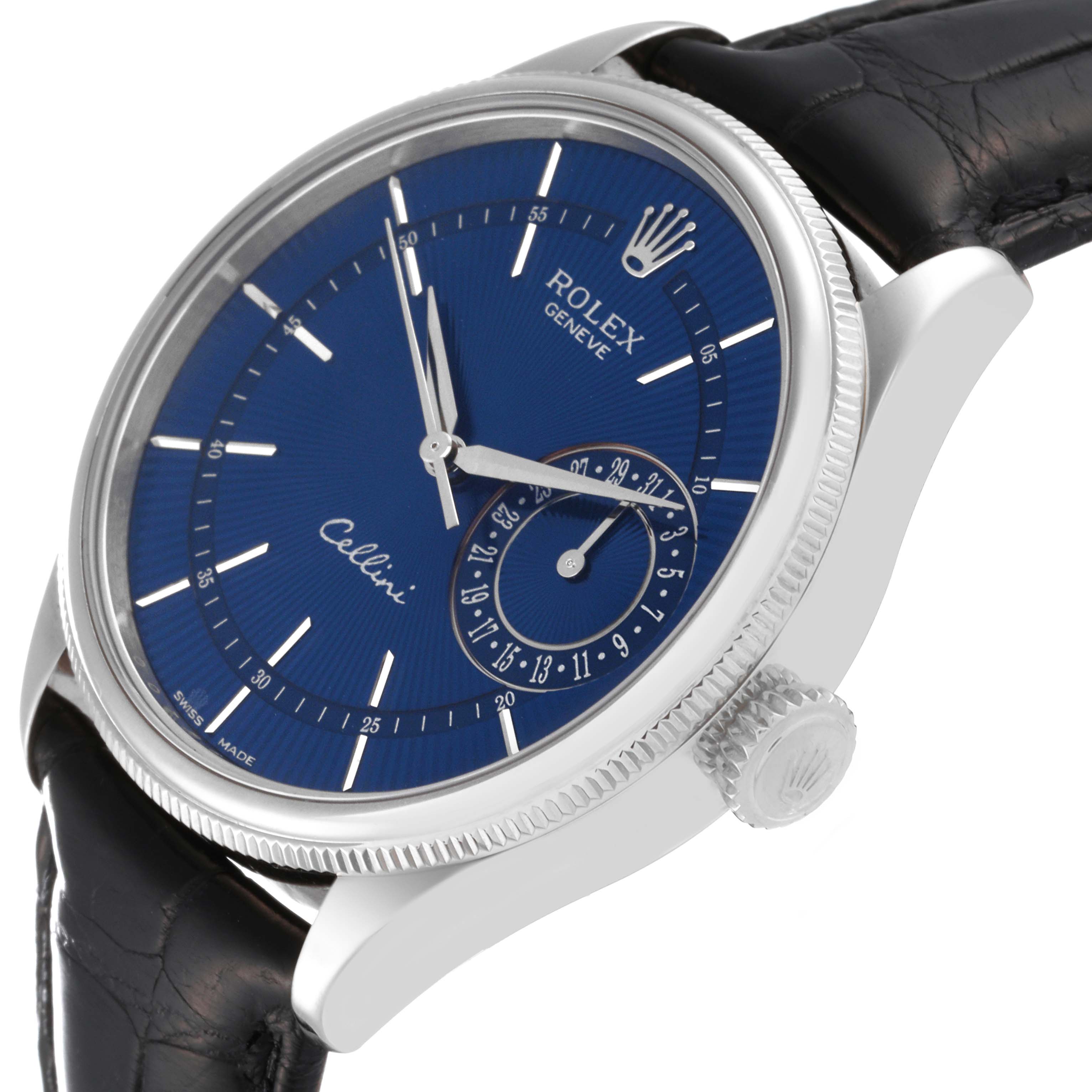 This Rolex Cellini 50519 Men's White Gold Blue Dial 50519 Men's White Gold Blue Dial watch is shown at an angled close-up, displaying its blue dial, crown, and part of the black leather strap.
