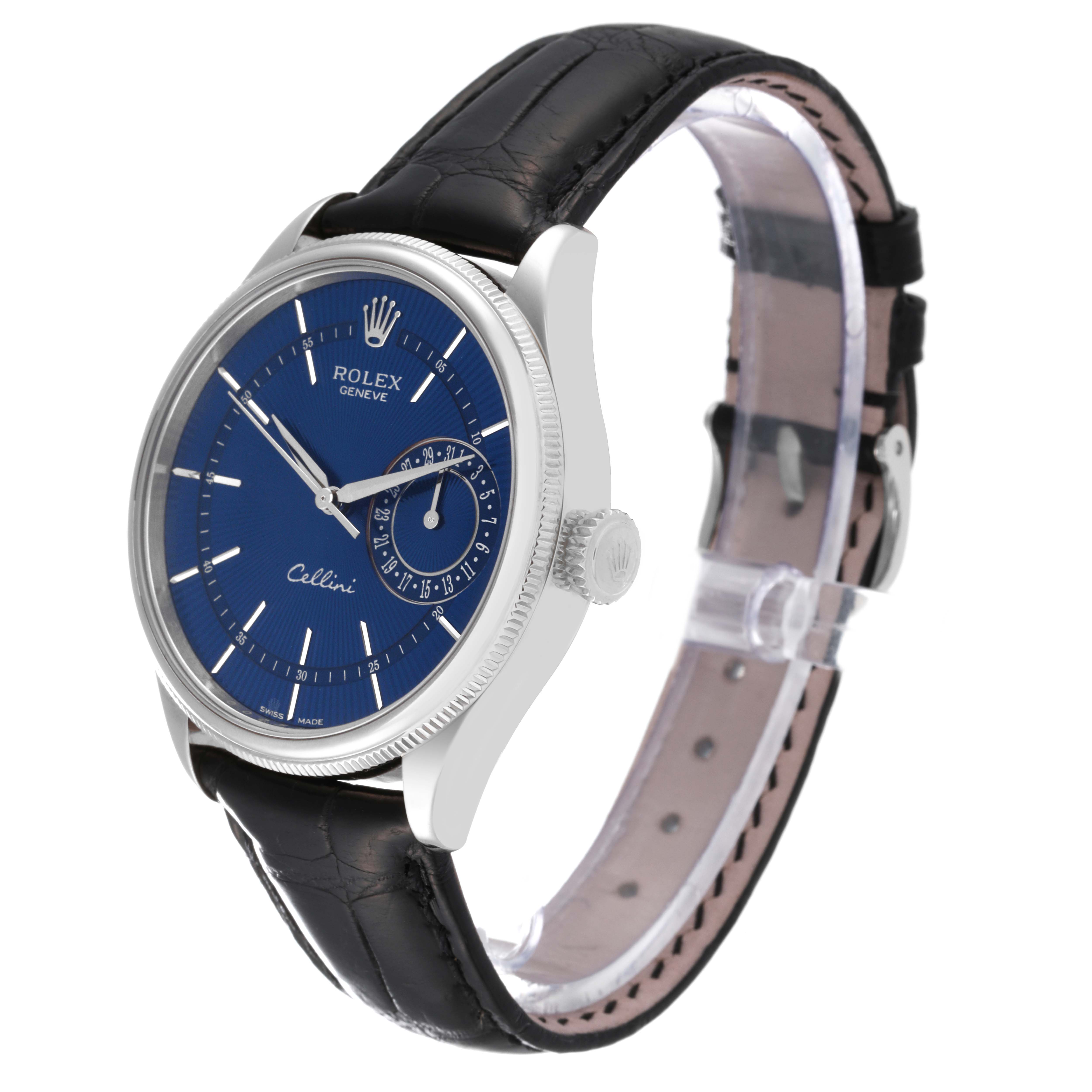 The Rolex Cellini 50519 Men's White Gold Blue Dial 50519 Men's White Gold Blue Dial watch is shown at an angle displaying the dial, case, crown, and leather strap.