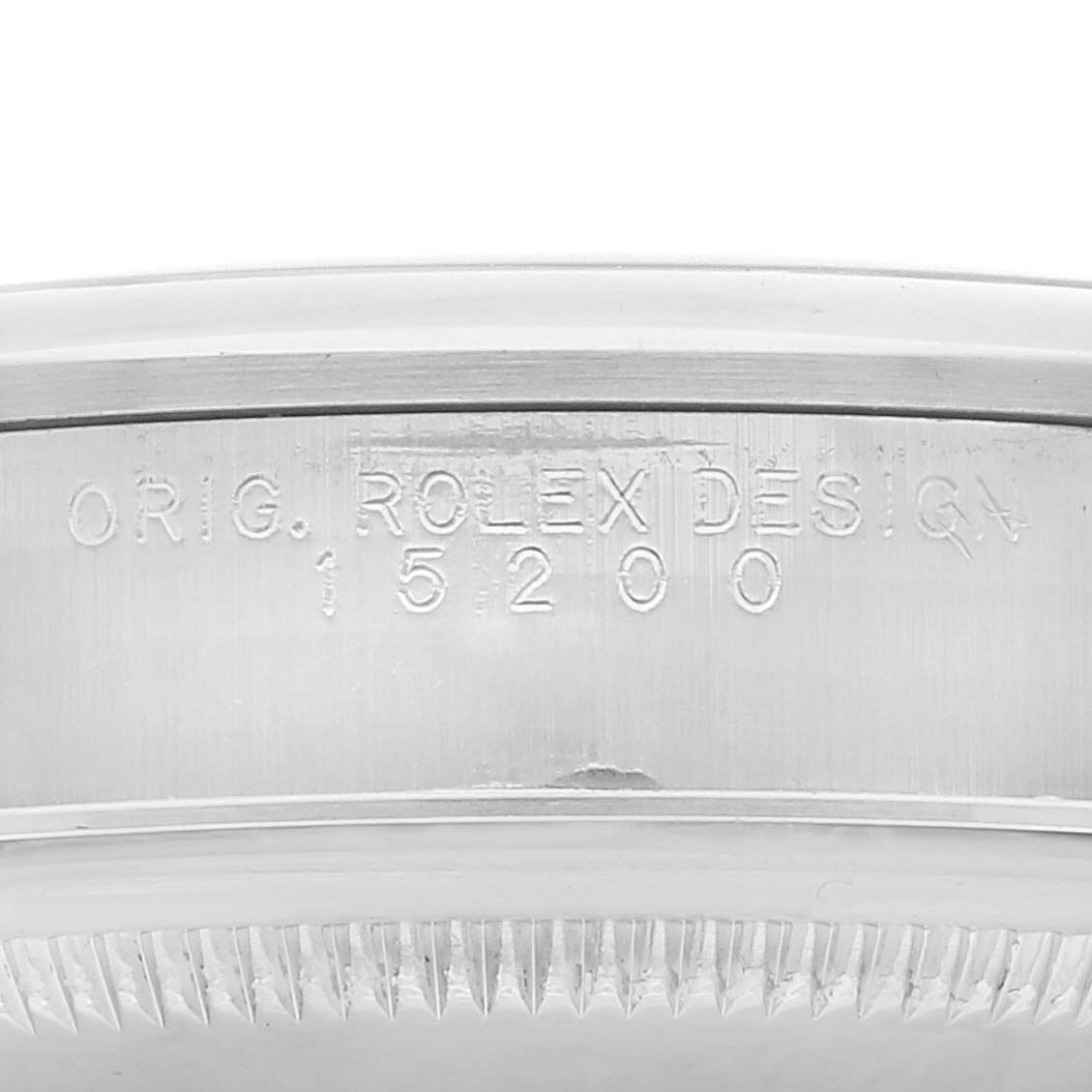 This image shows a close-up of the side case number engraving on a Rolex Date 15200 Men's Stainless Steel Blue Dial 15200 Men's Stainless Steel Blue Dial model watch.