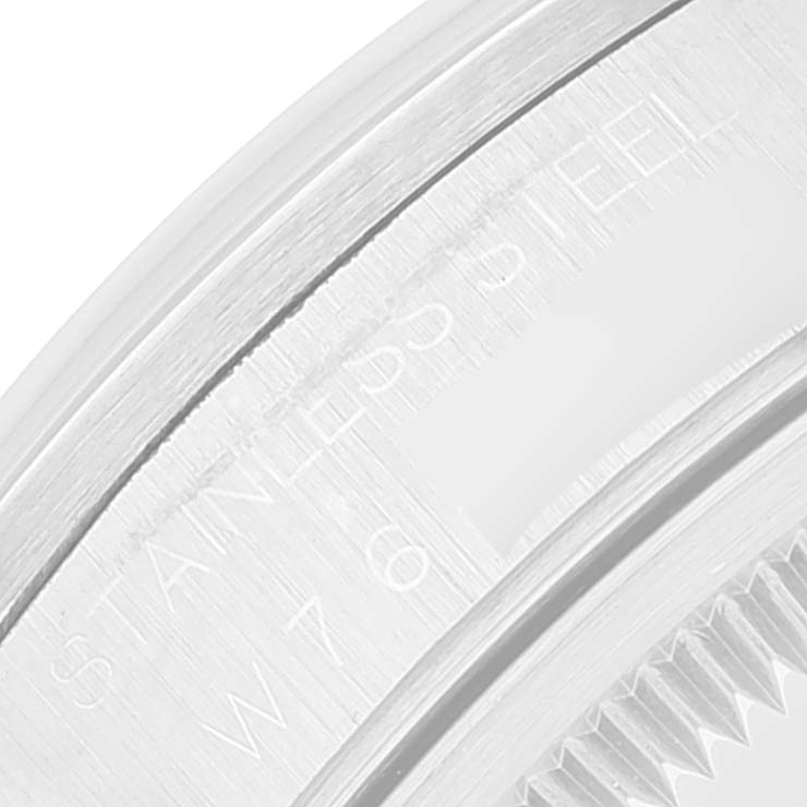 This image shows an extreme close-up of the stainless steel edge and markings on a Rolex Date 15200 Men
s Stainless Steel White Dial 15200 Men
s Stainless Steel White Dial model watch.