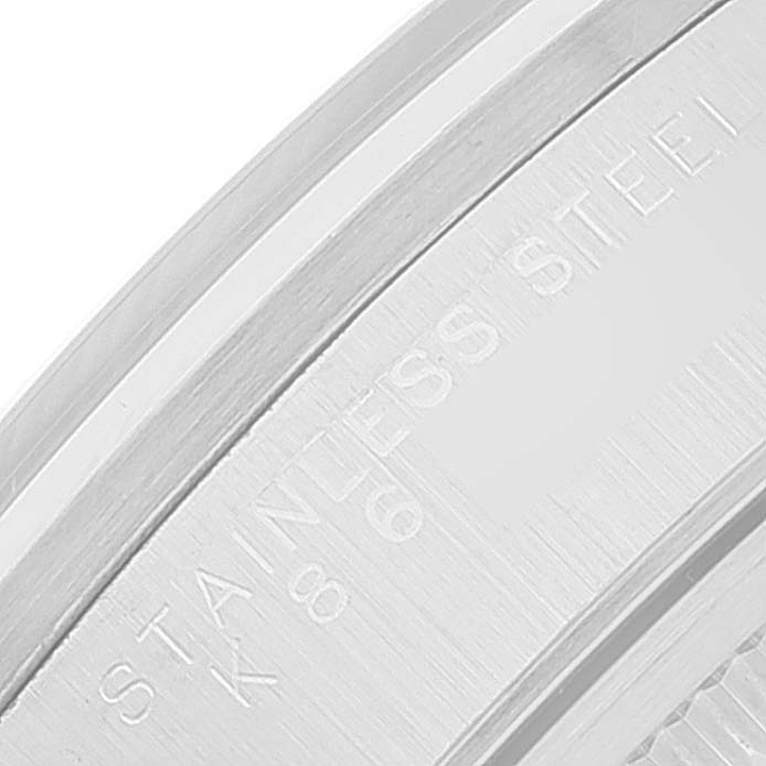 This image shows a close-up of the stainless steel marking on the case back or bezel of a Rolex Date 15200 Men's Stainless Steel Silver Dial 15200 Men's Stainless Steel Silver Dial model.