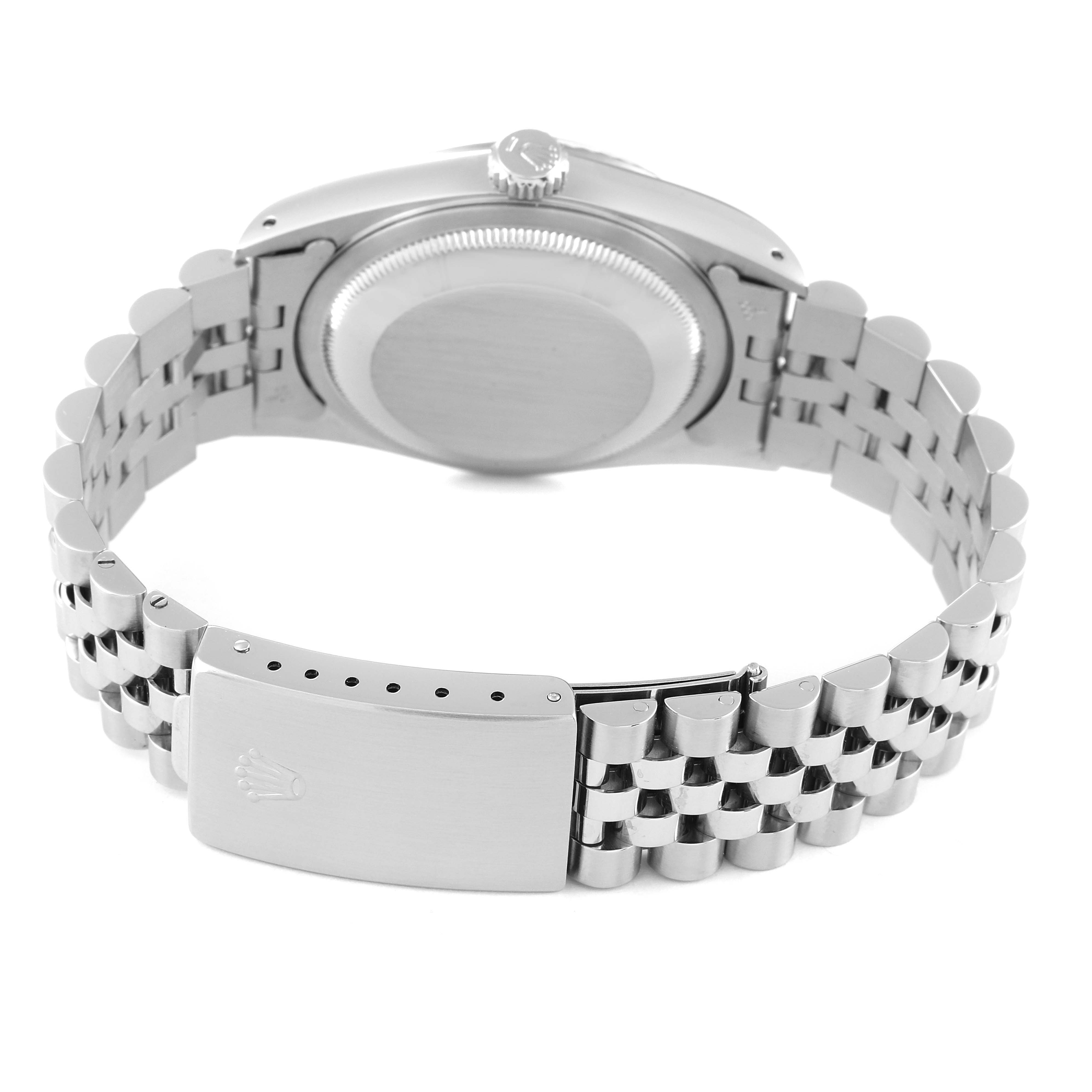 The image shows the back of a Rolex Datejust 16234 Men's Stainless Steel Black Dial 16234 Men's Stainless Steel Black Dial watch, highlighting the case back, crown, and the bracelet with the clasp.