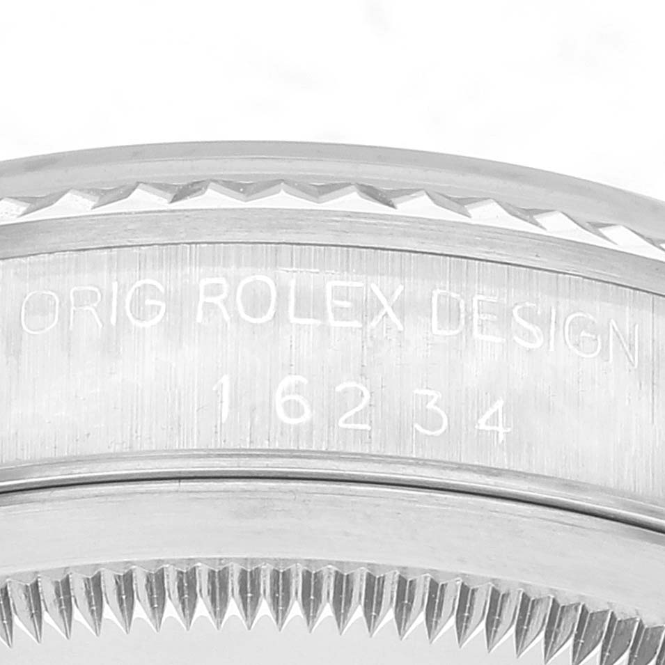 The image shows a close-up view of the side casing and bezel of a Rolex Datejust 16234 Men's Stainless Steel Black Dial 16234 Men's Stainless Steel Black Dial watch, including the engraved model number "16234."