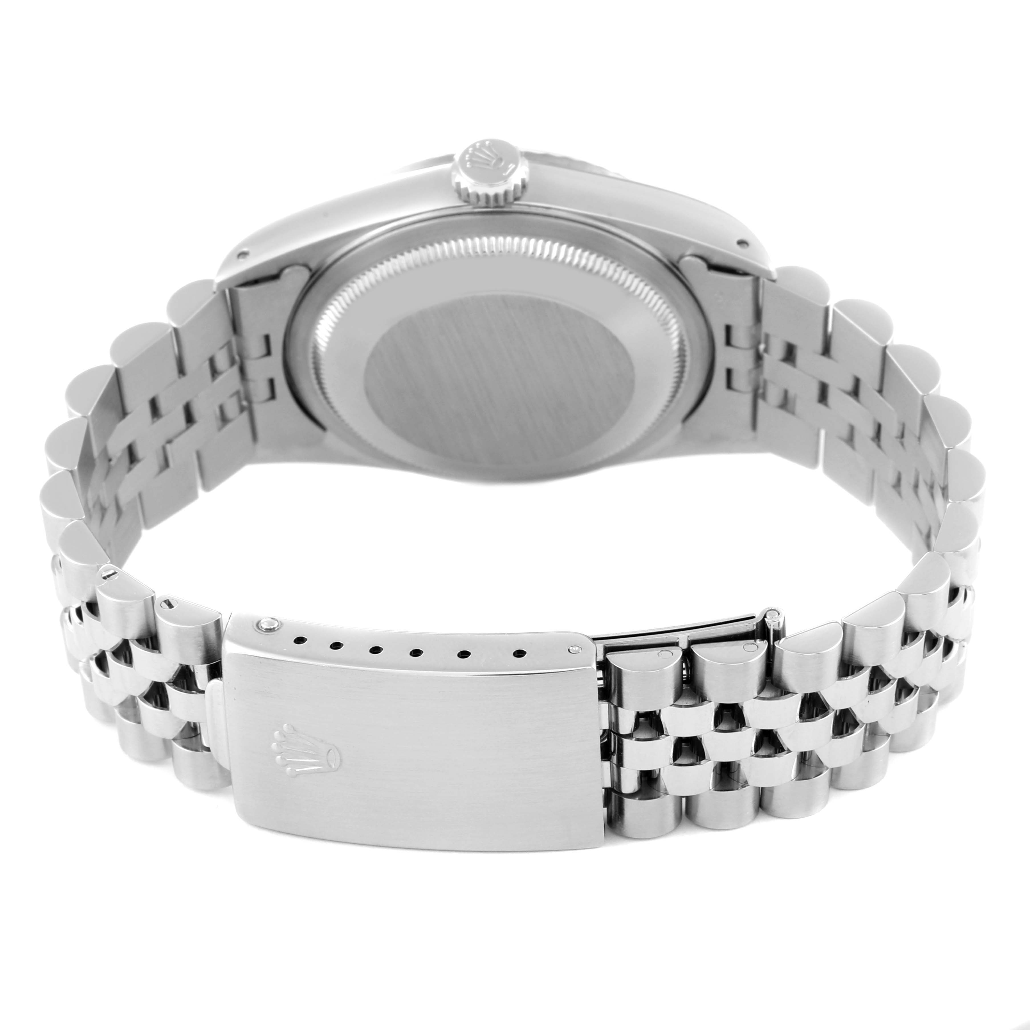 The image shows the back view of a Rolex Datejust 16234 Men's Stainless Steel Blue Dial 16234 Men's Stainless Steel Blue Dial watch, highlighting the case back and the bracelet with the clasp.