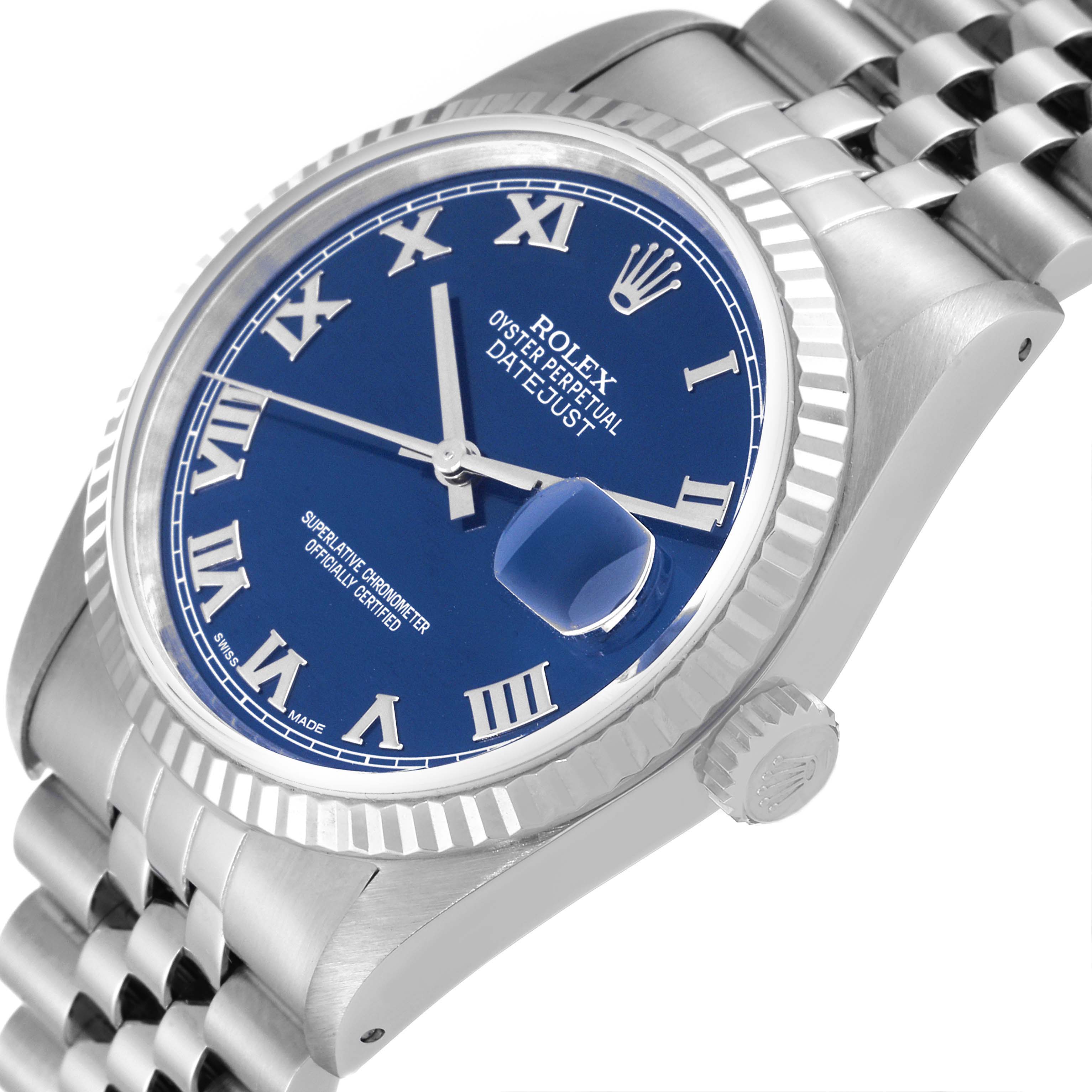 The image shows a Rolex Datejust 16234 Men's Stainless Steel Blue Dial 16234 Men's Stainless Steel Blue Dial watch at an angle, highlighting the blue dial, fluted bezel, and part of the jubilee bracelet.