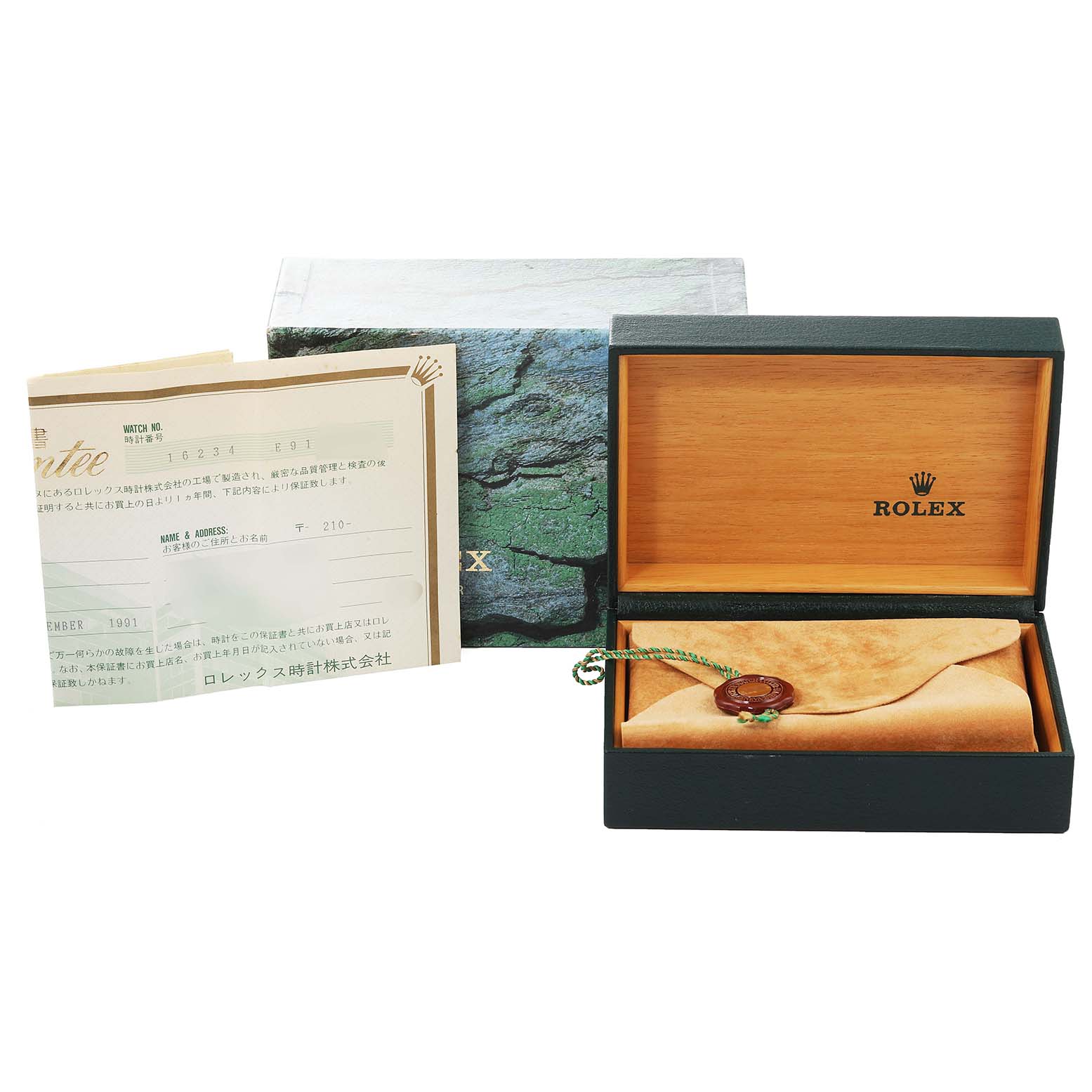 The image shows the Rolex Datejust 16234 Men's Stainless Steel Blue Dial 16234 Men's Stainless Steel Blue Dial packaging box, warranty card, and a watch cloth.