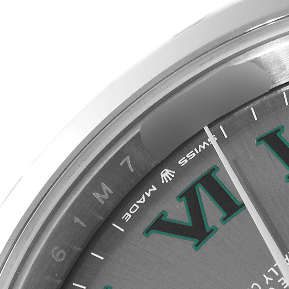 This image shows a close-up, angled view of the dial and bezel of the Rolex Datejust 41 126300 Men
s Stainless Steel Grey Dial 126300 Men
s Stainless Steel Grey Dial watch, highlighting the "SWISS MADE" text.
