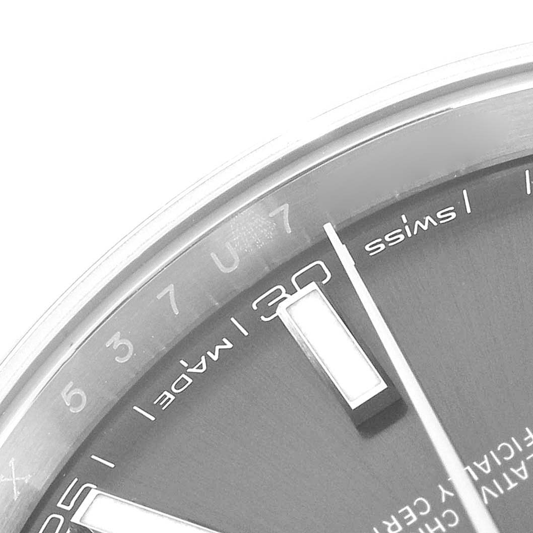The image shows a close-up of the dial and indices of the Rolex Datejust 41, model 126300, with parts of the hands and date window visible.