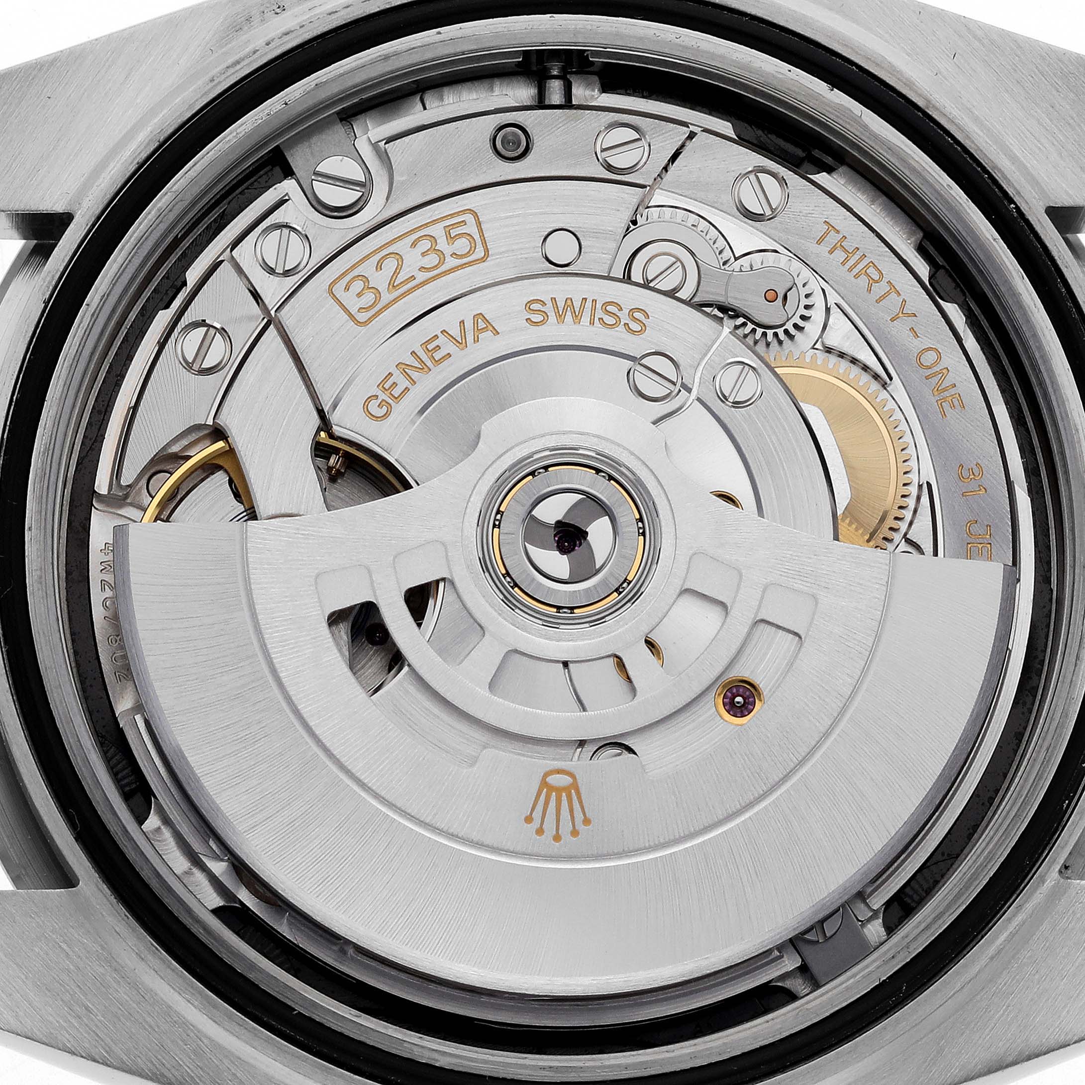 The image shows the movement and inner workings of a Rolex Datejust 41 126334 Men's Stainless Steel Black Dial 126334 Men's Stainless Steel Black Dial watch, focusing on the automatic rotor and mechanical components.