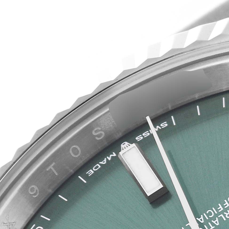 This image shows a close-up of the dial and bezel of a Rolex Datejust 41 126334 Men
s Stainless Steel Green Dial 126334 Men
s Stainless Steel Green Dial watch.