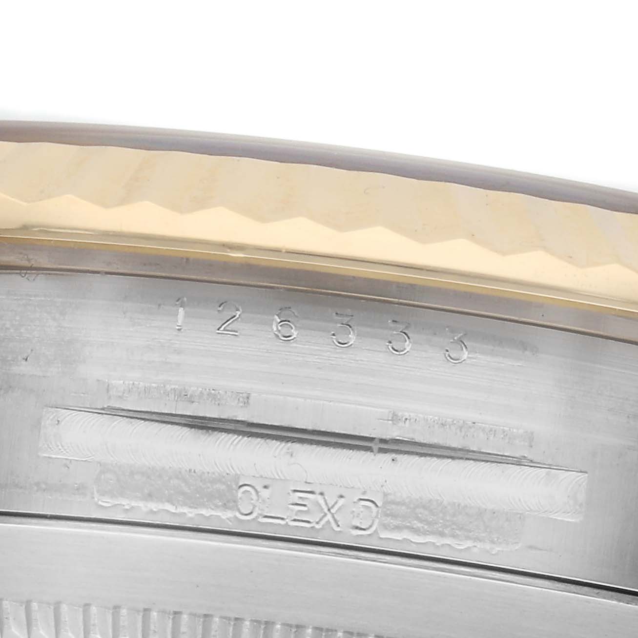 The image shows a close-up of the case edge of the Rolex Datejust 41, model 126333, highlighting the engraved model number on the metal part.