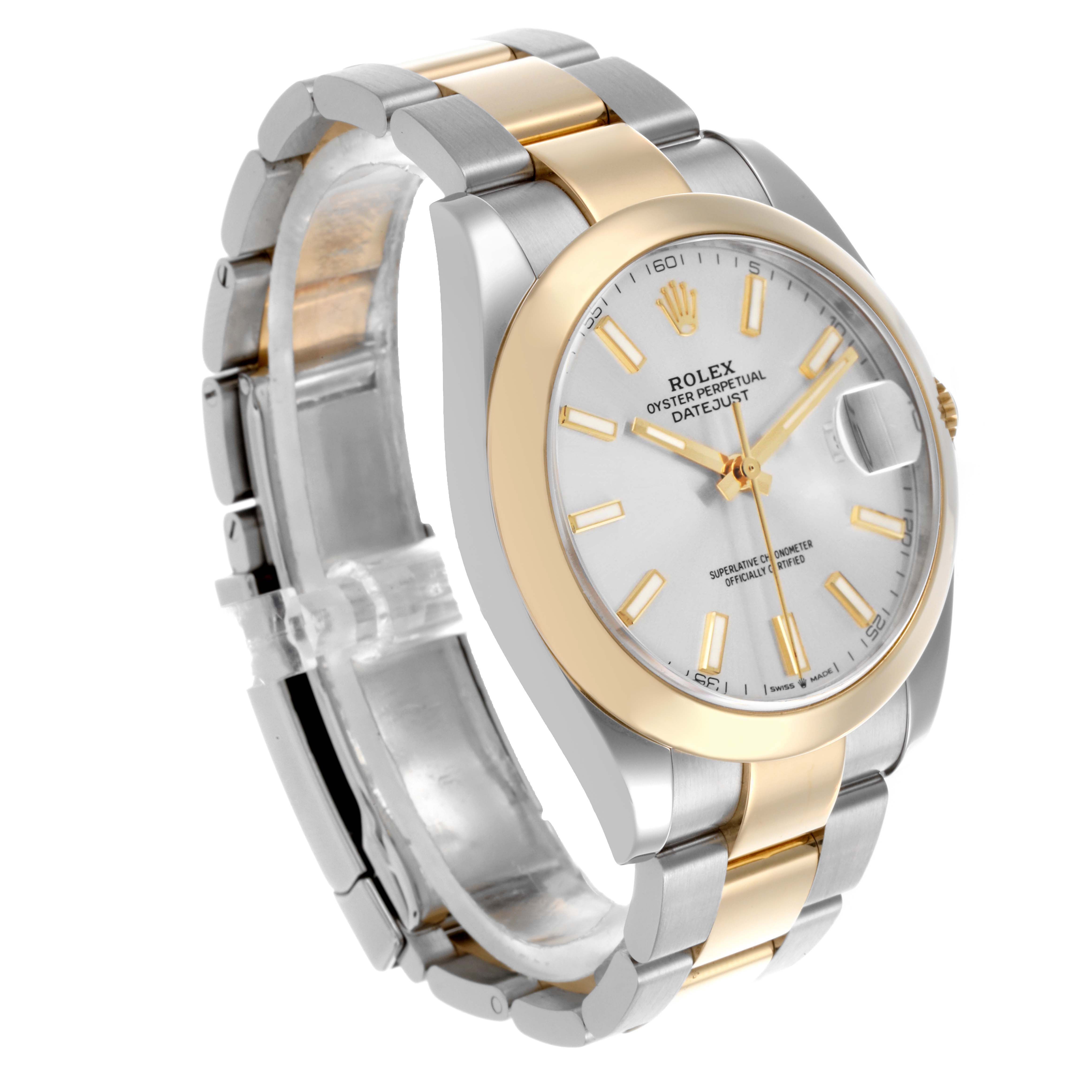 The Rolex Datejust 41 model 126303 is shown at a three-quarter angle, displaying its two-tone bracelet, gold bezel, and dial with a date window.