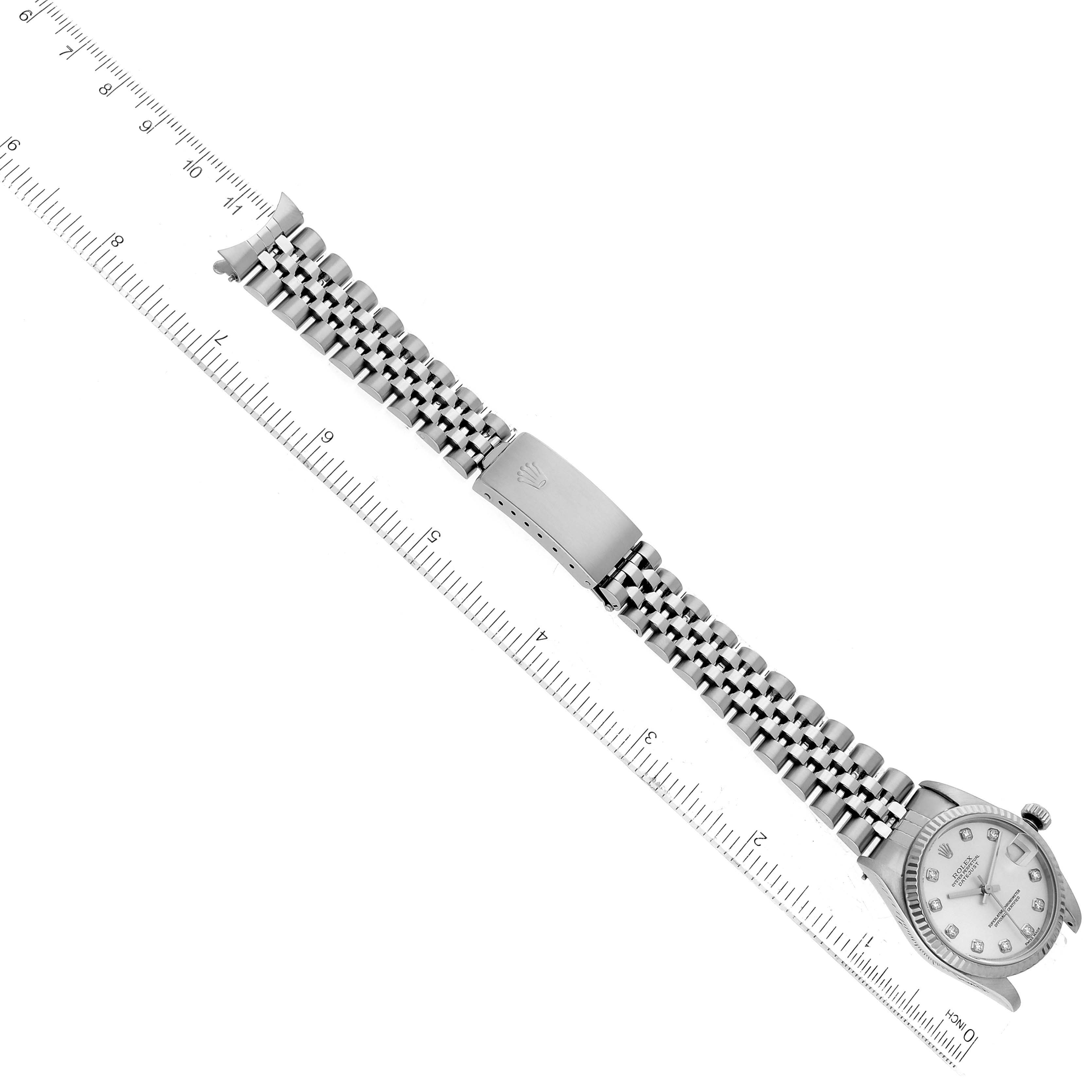 The image shows the Rolex Mid-Size 78274 Women's Stainless Steel Silver Dial 78274 Women's Stainless Steel Silver Dial model watch laid flat with a stainless steel bracelet and clasp, measured alongside a ruler.