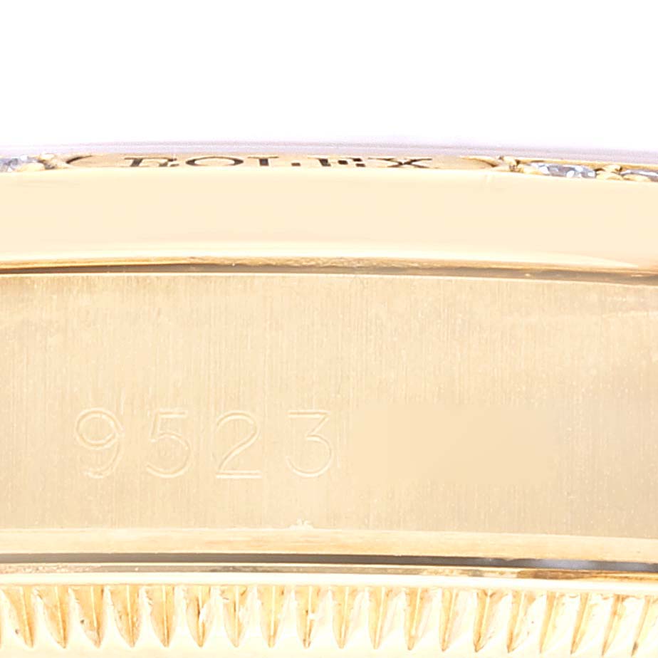 The image shows the side view of a Rolex President 68158 Women's Yellow Gold Champagne Dial 68158 Women's Yellow Gold Champagne Dial model watch, highlighting the serial number and part of the bezel.