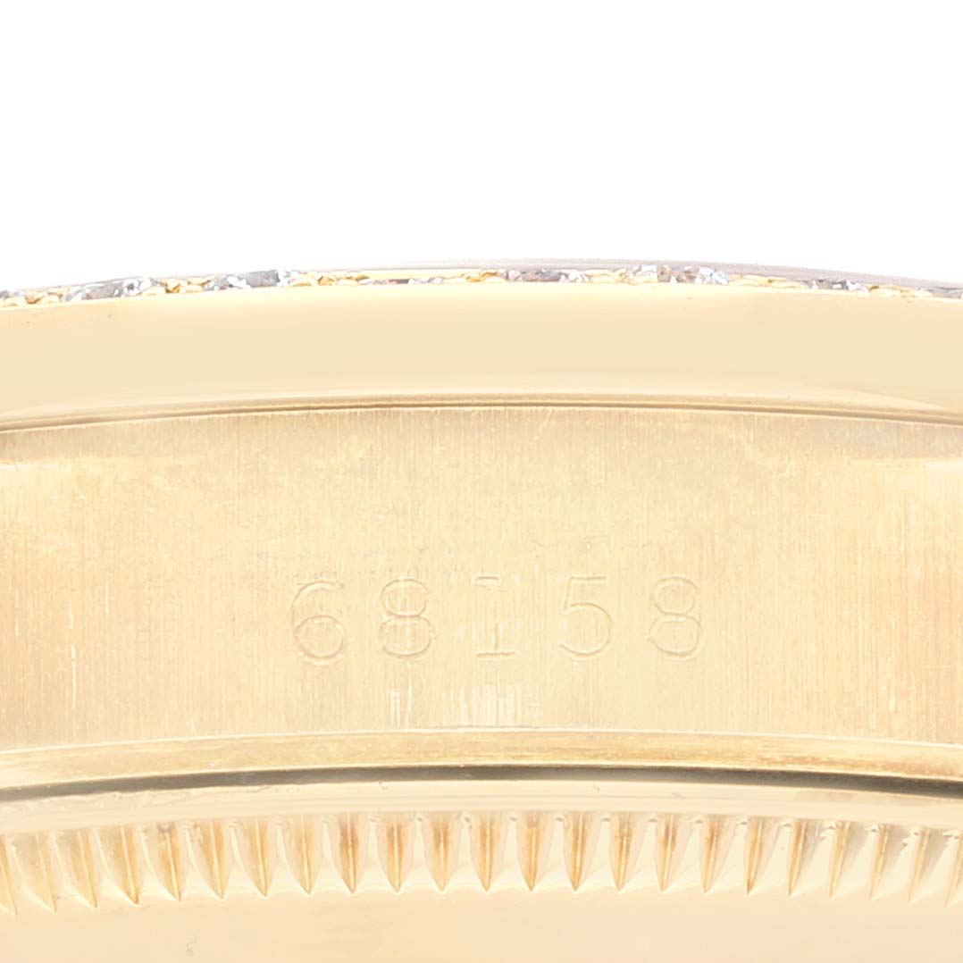 This close-up image shows the case and model number of a Rolex President 68158 Women's Yellow Gold Champagne Dial 68158 Women's Yellow Gold Champagne Dial watch.