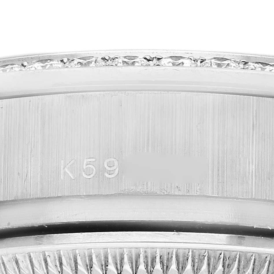 The image shows a close-up side view of the Rolex President model 179159 watch, highlighting parts of the bezel and case with visible engravings.