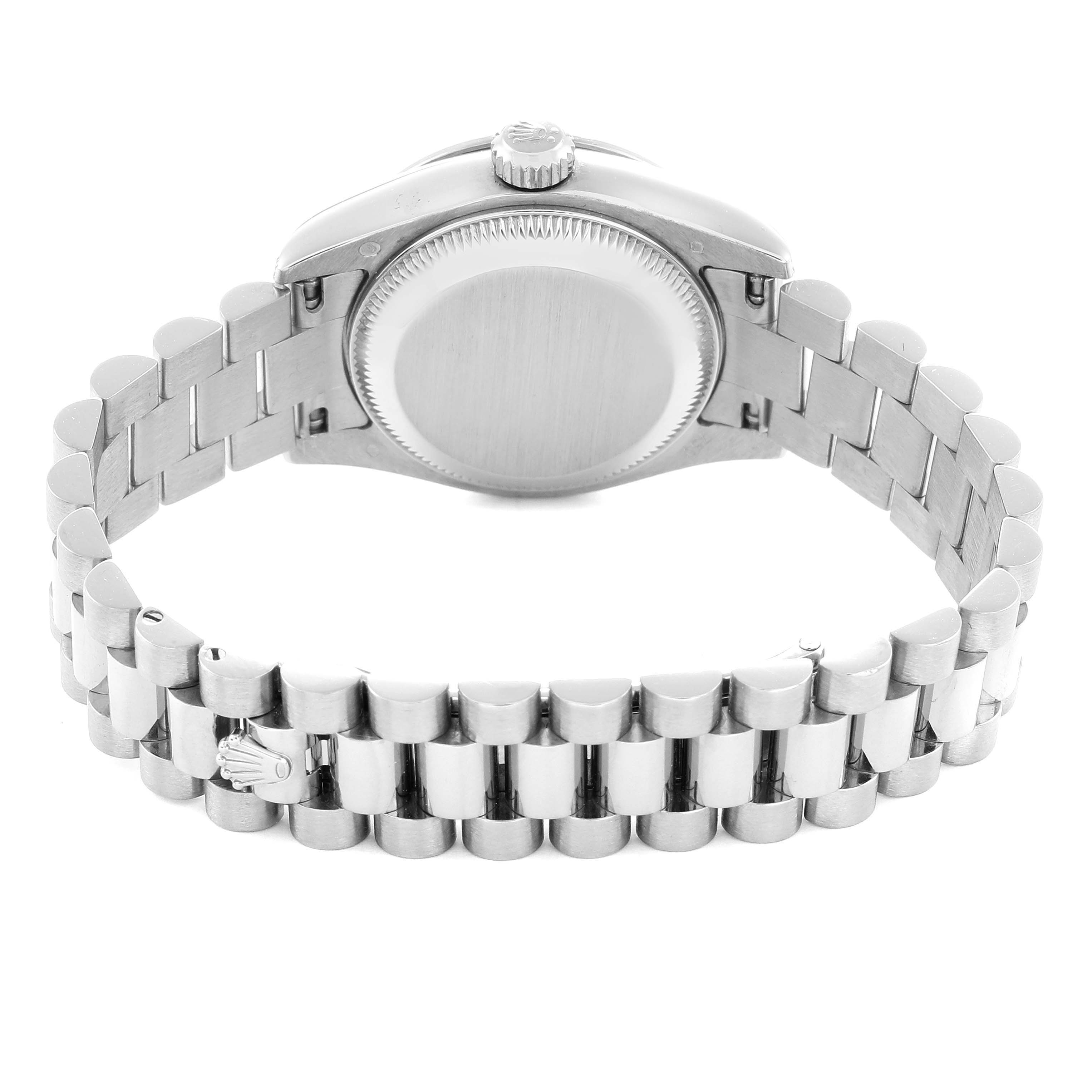 The image shows the back of the Rolex President model 179159 watch, highlighting the case, crown, and bracelet links from a rear angle.