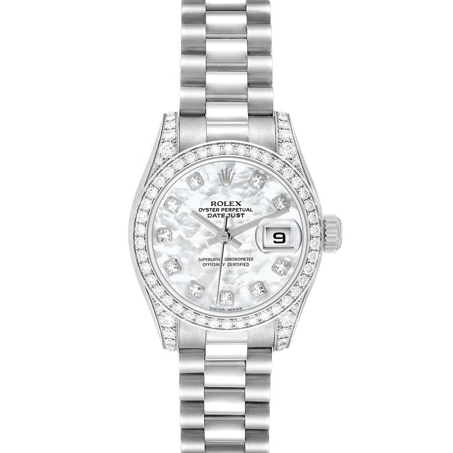 The Rolex President model 179159 men's watch is shown from a top-down angle, highlighting its bracelet, diamond-set bezel, and dial with date indication.