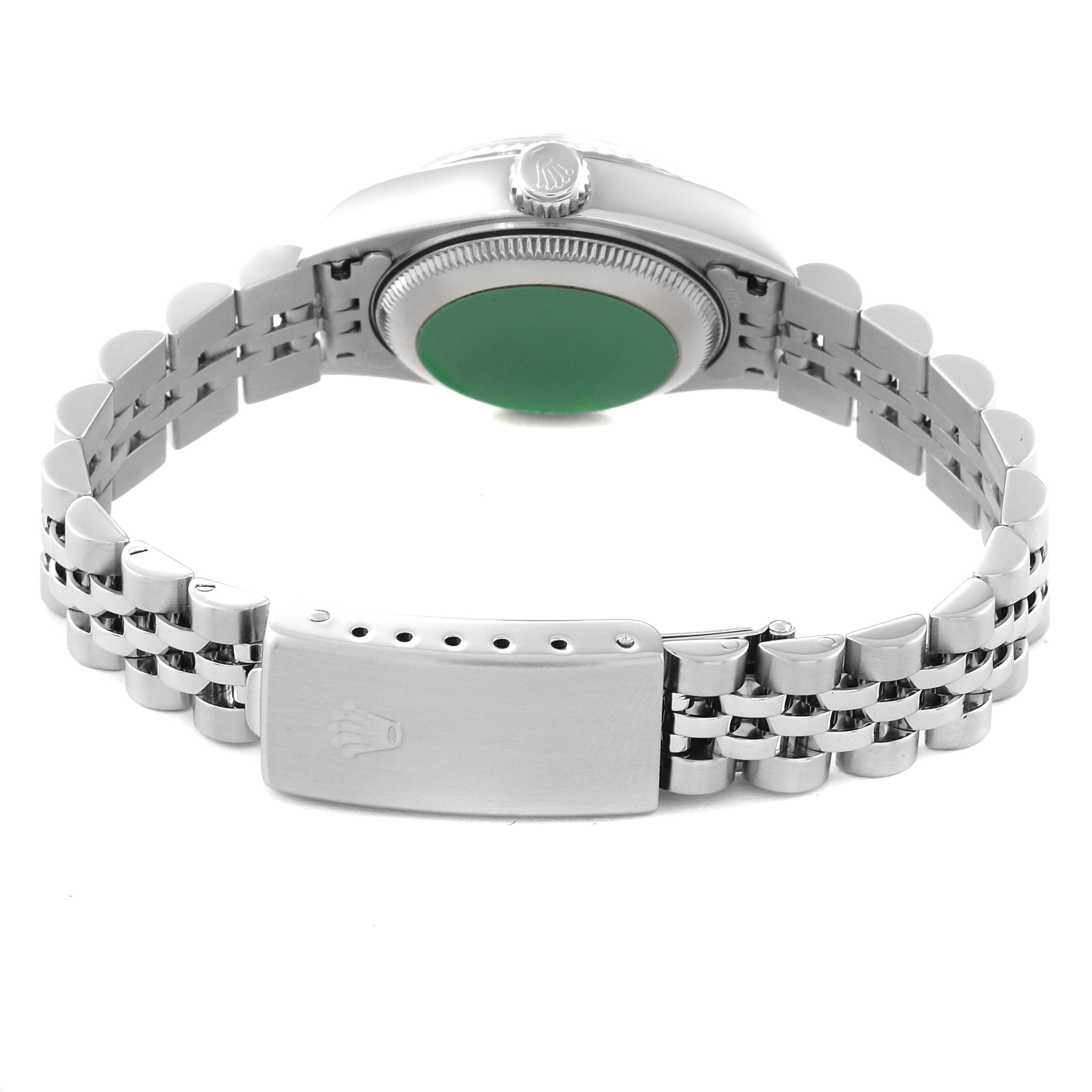 The image shows the back view of a Rolex Datejust 79174 Women's Stainless Steel Black Dial 79174 Women's Stainless Steel Black Dial watch, highlighting its bracelet and clasp.