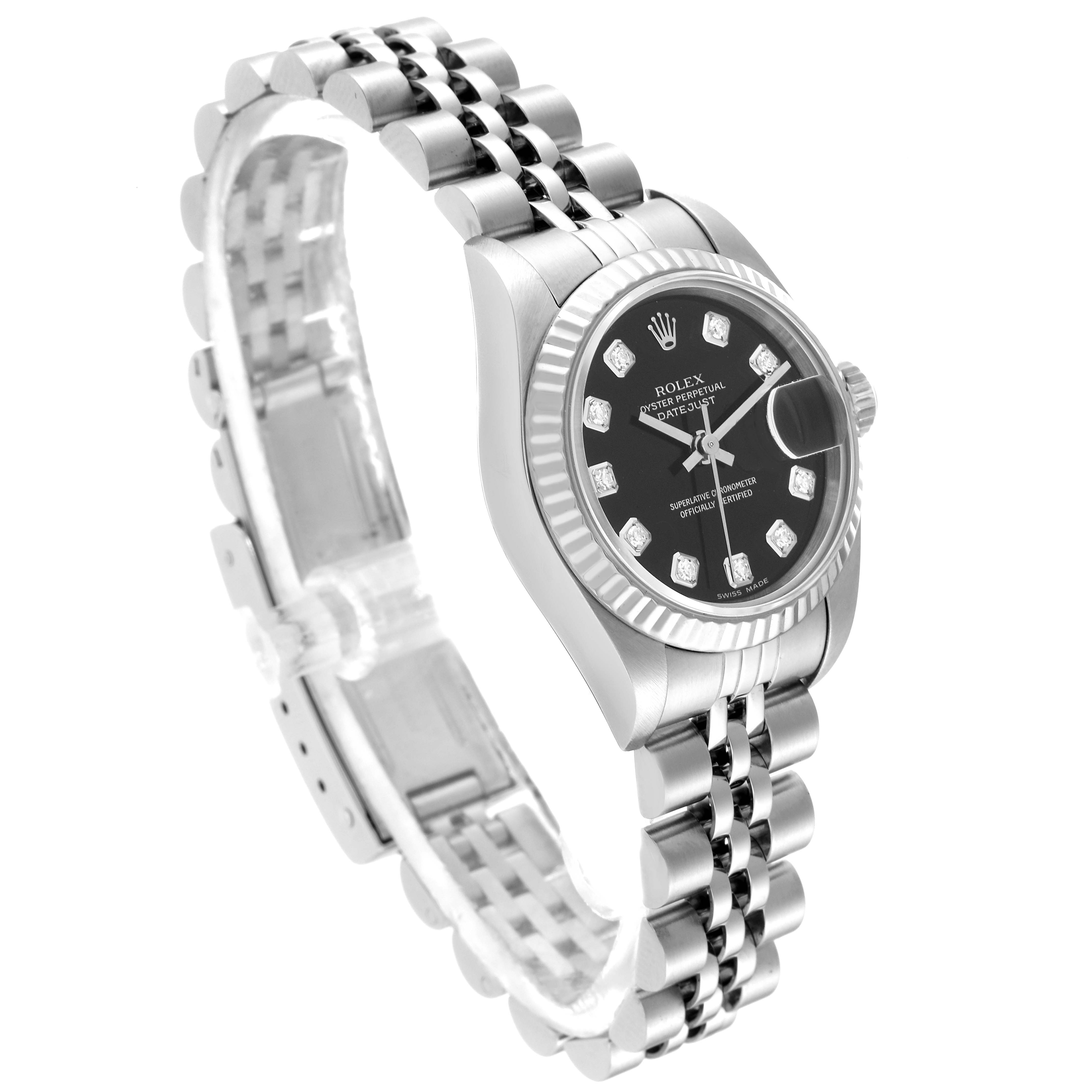 The image shows a Rolex Datejust 79174 Women's Stainless Steel Black Dial 79174 Women's Stainless Steel Black Dial watch angled to display the face, bezel, and part of the bracelet.