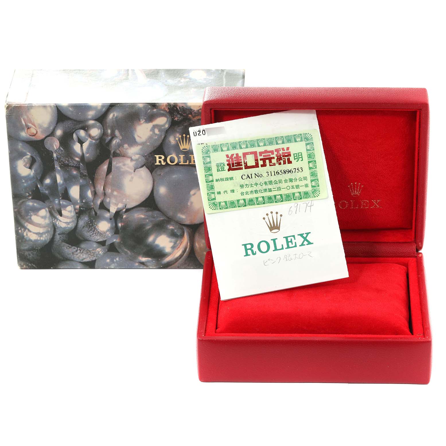 The image shows a red Rolex box for the Datejust model, an external box, and a document with Rolex branding.