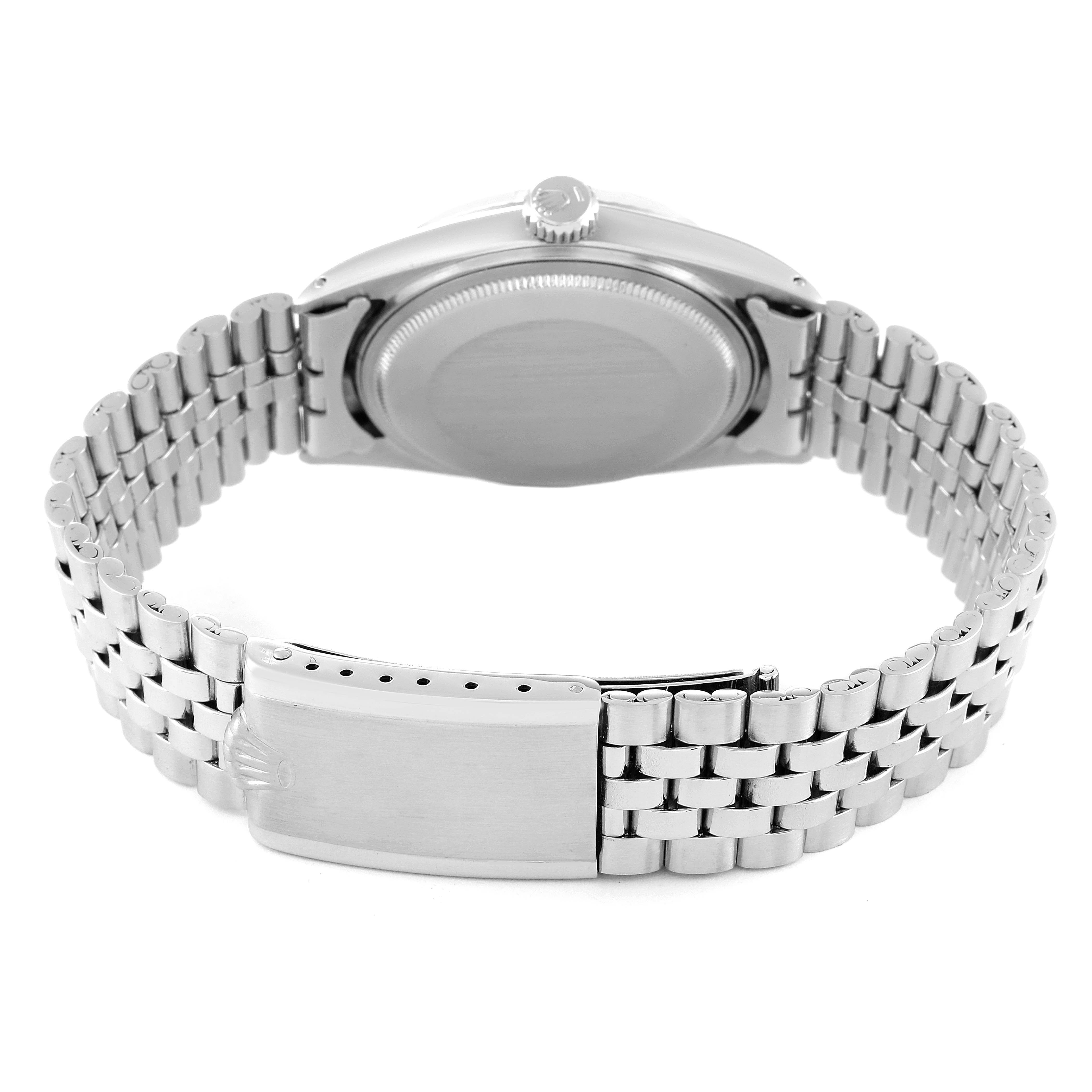 This image shows the back case and bracelet clasp of a Rolex Datejust 1601 Men
s Stainless Steel Silver Dial 1601 Men
s Stainless Steel Silver Dial watch from a rear angle.