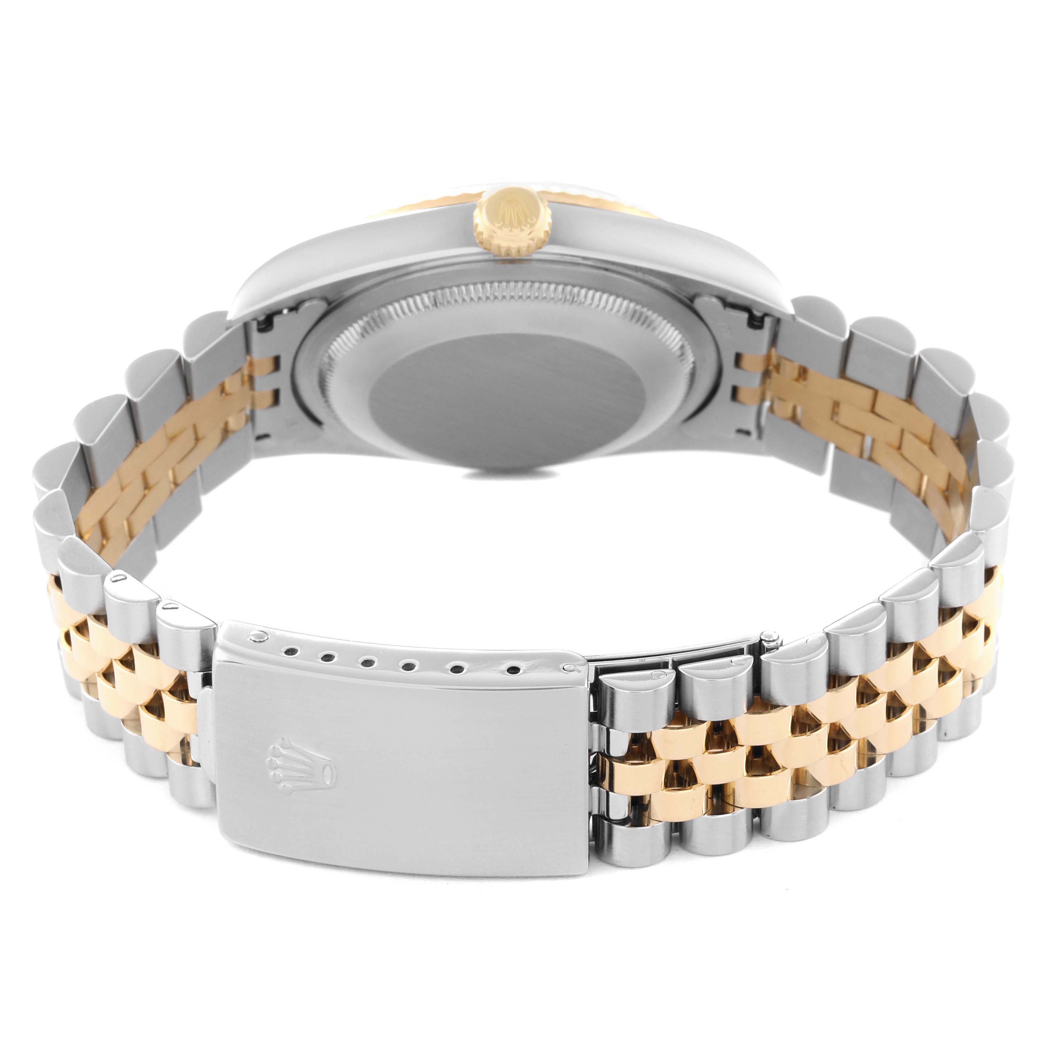 The image shows the back view of the Rolex Datejust 16233 Men's Steel and Gold (two tone) White Dial 16233 Men's Steel and Gold (two tone) White Dial watch with its two-tone Jubilee bracelet and clasp visible.