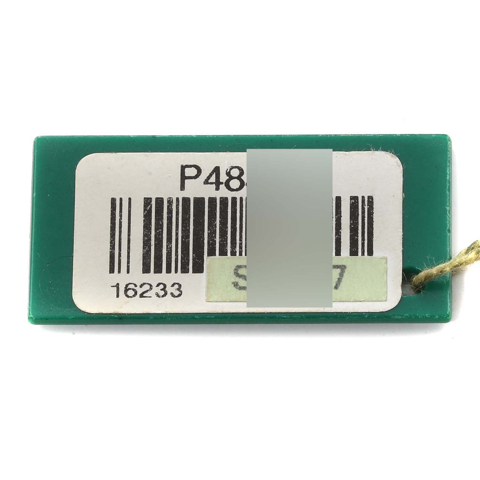 This image shows a green tag with a barcode and model number for a Rolex Datejust 16233 Men's Steel and Gold (two tone) White Dial 16233 Men's Steel and Gold (two tone) White Dial watch, model number 16233.