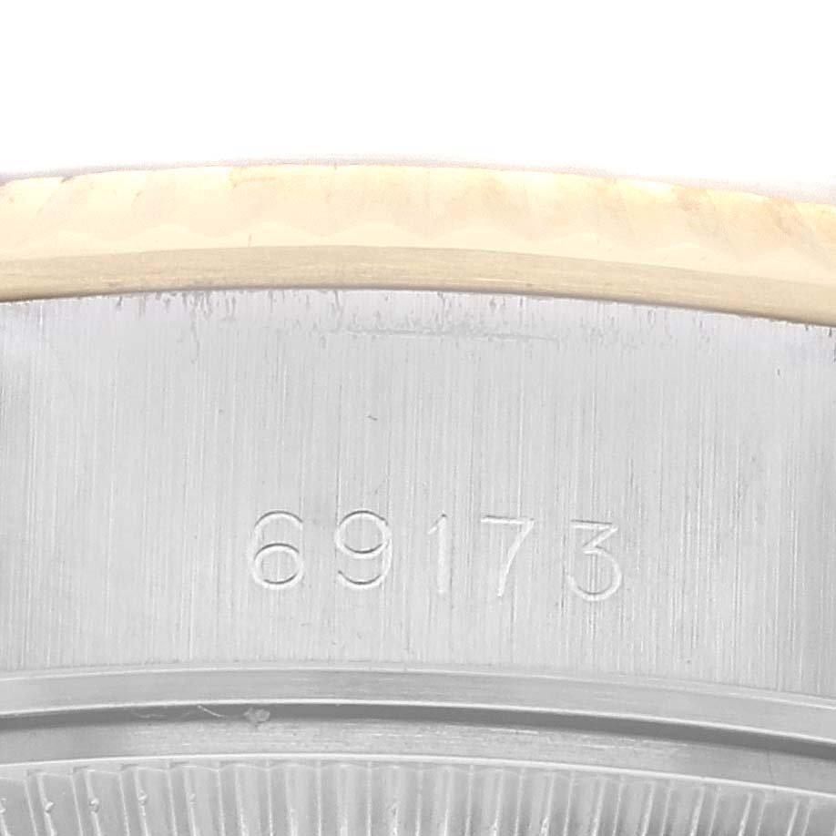 The image shows a close-up view of the casing with the reference number "69173" on the Rolex Datejust 69173 Women's Steel and Gold (two tone) Champagne Dial 69173 Women's Steel and Gold (two tone) Champagne Dial watch.