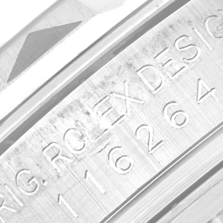 This close-up image shows part of the case with the model number engraving of the Rolex Turn-o-Graph 116264 Men's Stainless Steel Black Dial 116264 Men's Stainless Steel Black Dial watch.