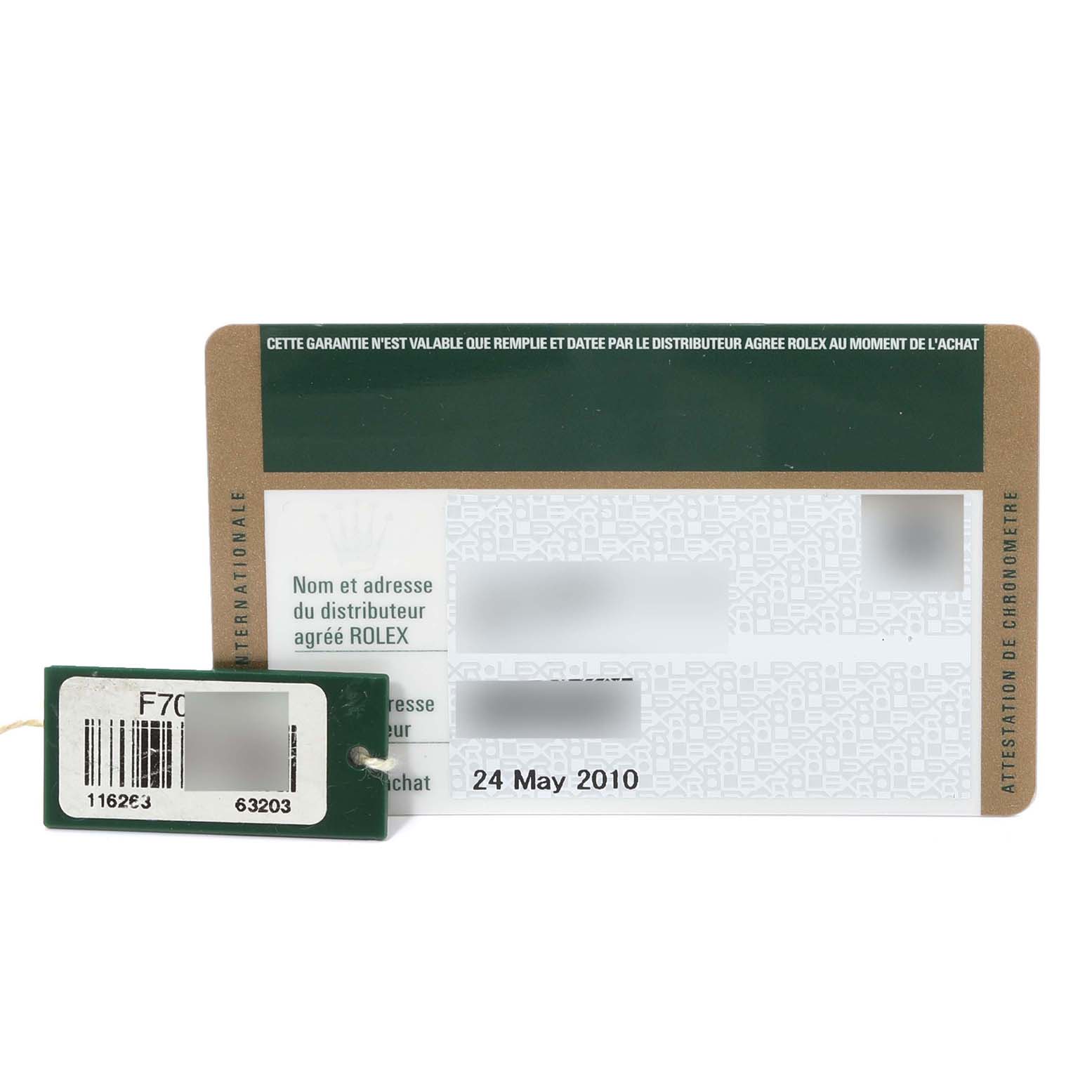 The image shows a guarantee card and a tag for the Rolex Turn-o-Graph 116263 Men
s Steel and Gold (two tone) White Dial 116263 Men
s Steel and Gold (two tone) White Dial model, displayed from a front-facing angle.