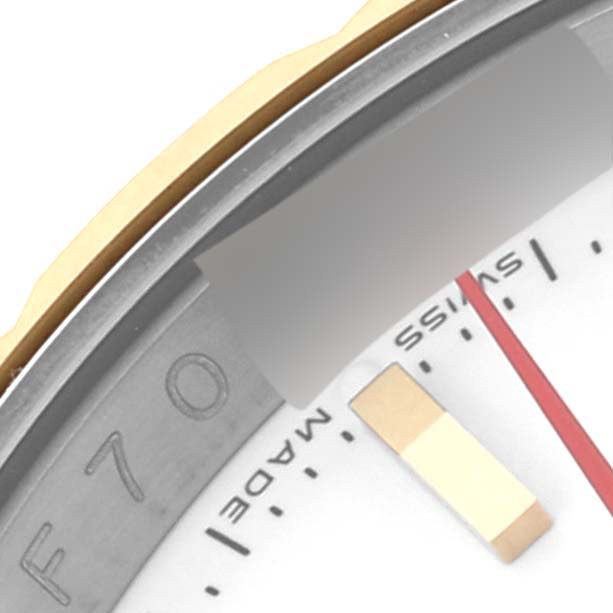 The image shows a close-up of the Rolex Turn-o-Graph 116263 Men
s Steel and Gold (two tone) White Dial 116263 Men
s Steel and Gold (two tone) White Dial watch face, highlighting the bezel, part of the dial, and the "SWISS MADE" text.