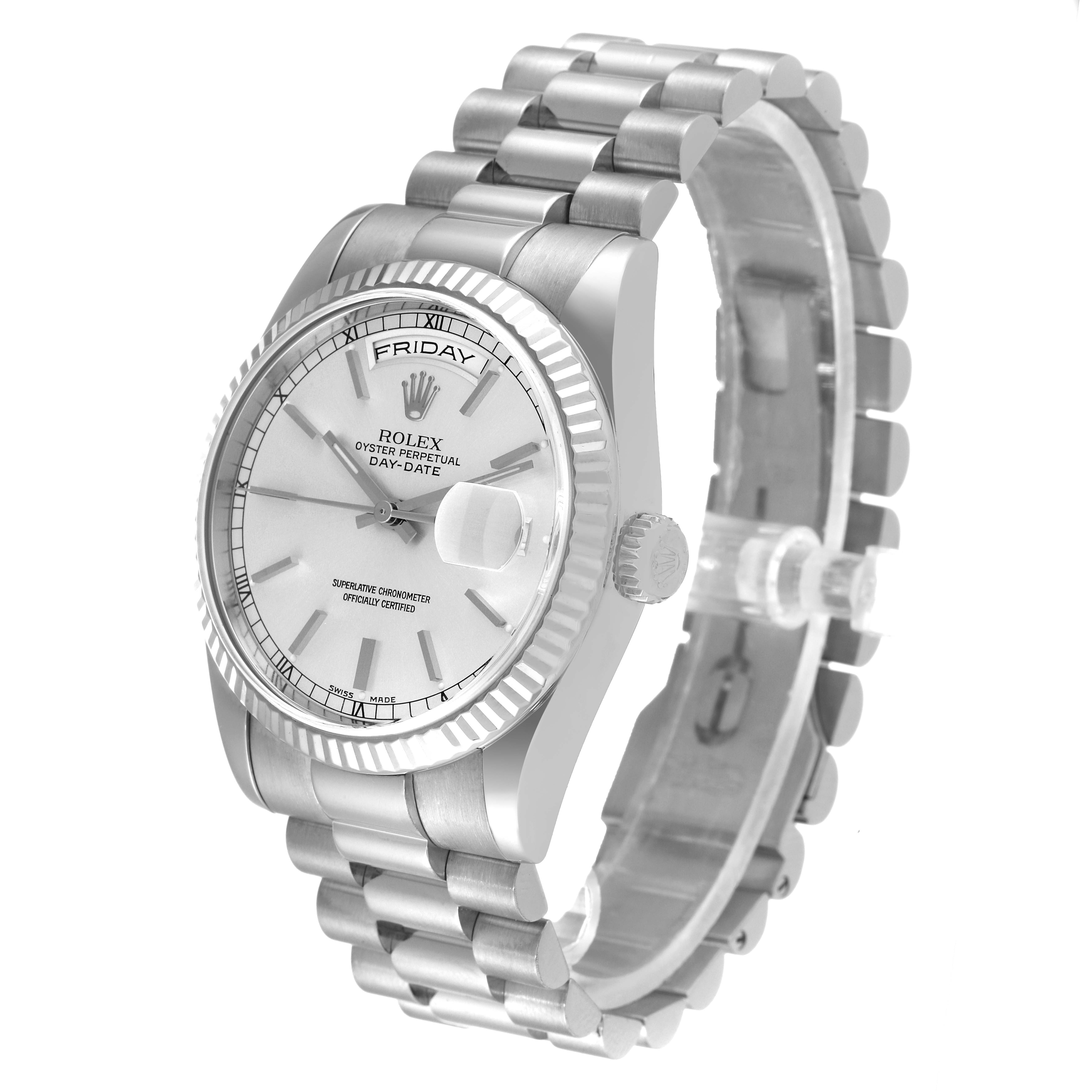 The Rolex President 118239 Men's White Gold Silver Dial 118239 Men's White Gold Silver Dial watch is shown at a 3/4 angle, highlighting its dial, bezel, bracelet, and distinctive day and date features.