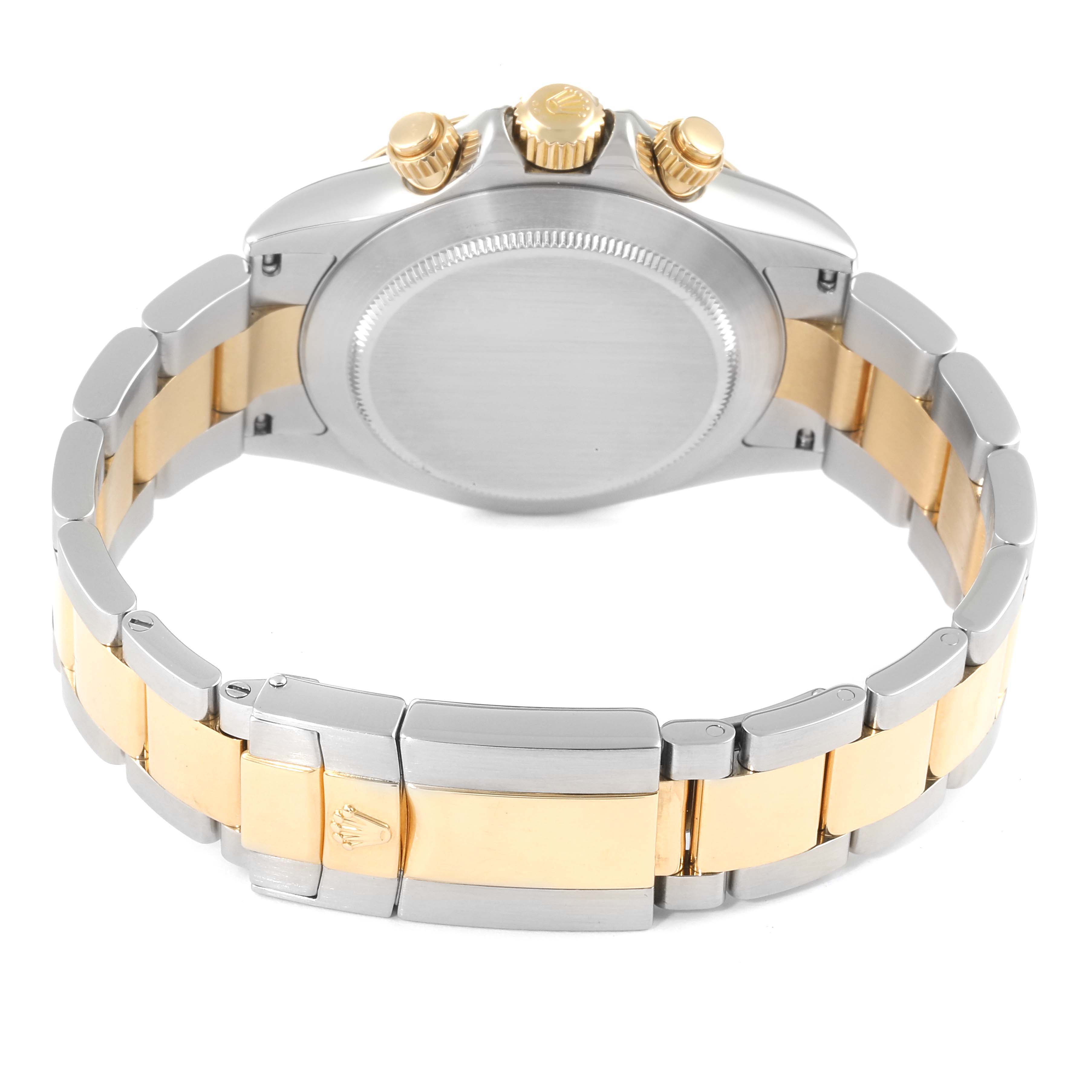 The image shows a Rolex Daytona 16523 Men's Steel and Gold (two tone) Grey Dial 16523 Men's Steel and Gold (two tone) Grey Dial watch from the back, highlighting its two-tone bracelet, clasp, and case back.