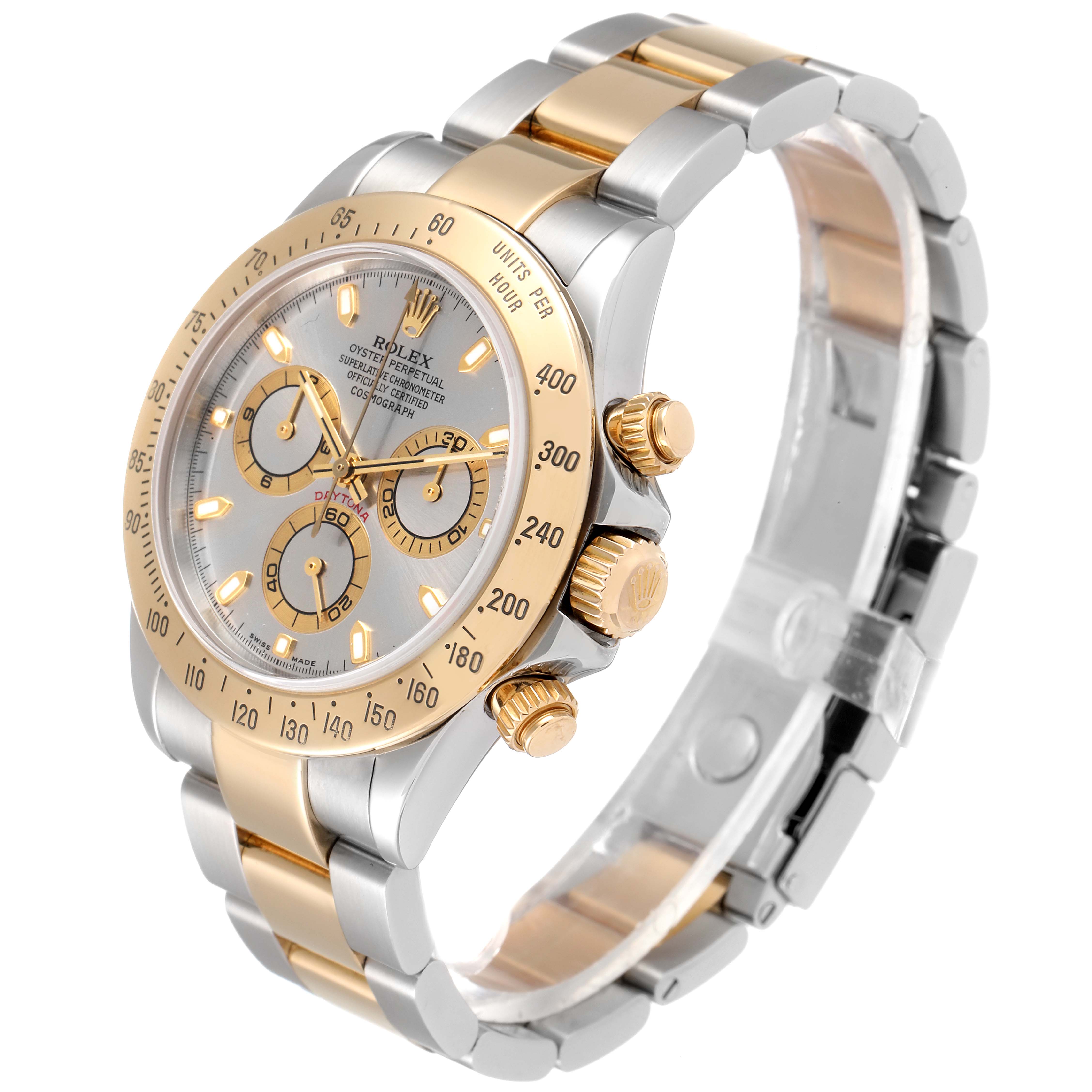 The Rolex Daytona 16523 Men's Steel and Gold (two tone) Grey Dial 16523 Men's Steel and Gold (two tone) Grey Dial watch is shown at a three-quarter angle, highlighting the face, bezel, and bracelet.