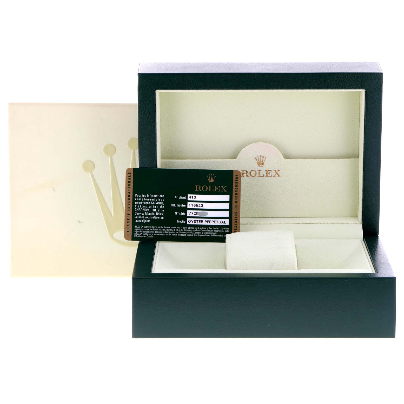 The image shows the Rolex Daytona 116523 Men
s Steel and Gold (two tone) Black Dial 116523 Men
s Steel and Gold (two tone) Black Dial watch box with a registration card placed inside.