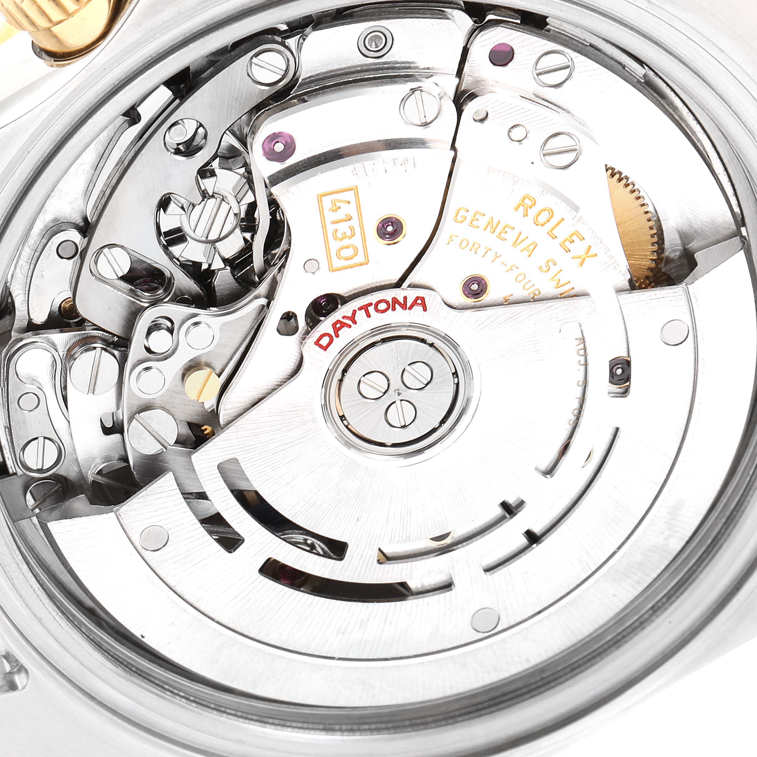 This image shows a close-up view of the Rolex Daytona 116523 Men
s Steel and Gold (two tone) Black Dial 116523 Men
s Steel and Gold (two tone) Black Dial model
s intricate movement and internal mechanism.