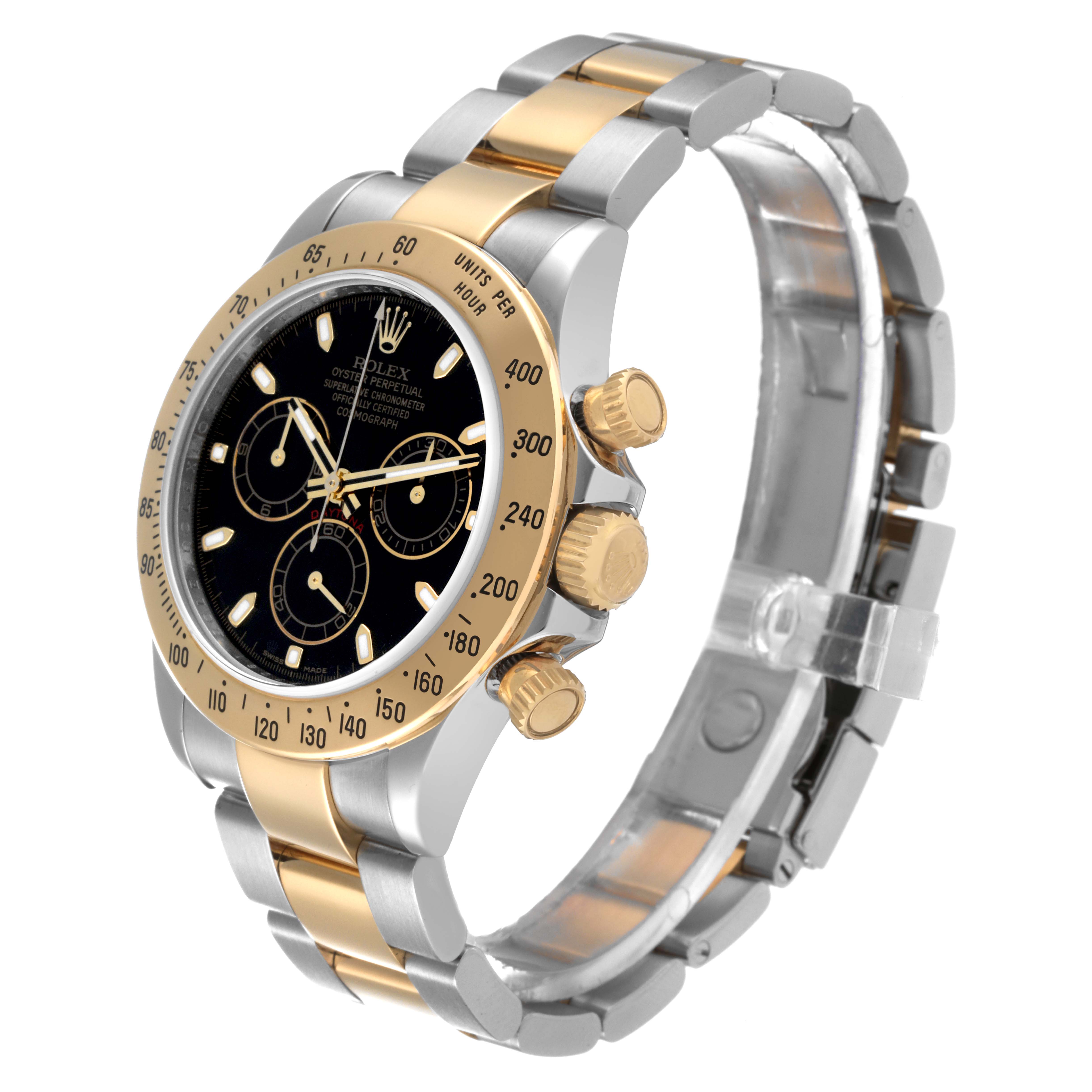 This image shows a Rolex Daytona 116523 Men's Steel and Gold (two tone) Black Dial 116523 Men's Steel and Gold (two tone) Black Dial watch at an angle highlighting the dial, bezel, crown, and the two-tone bracelet.
