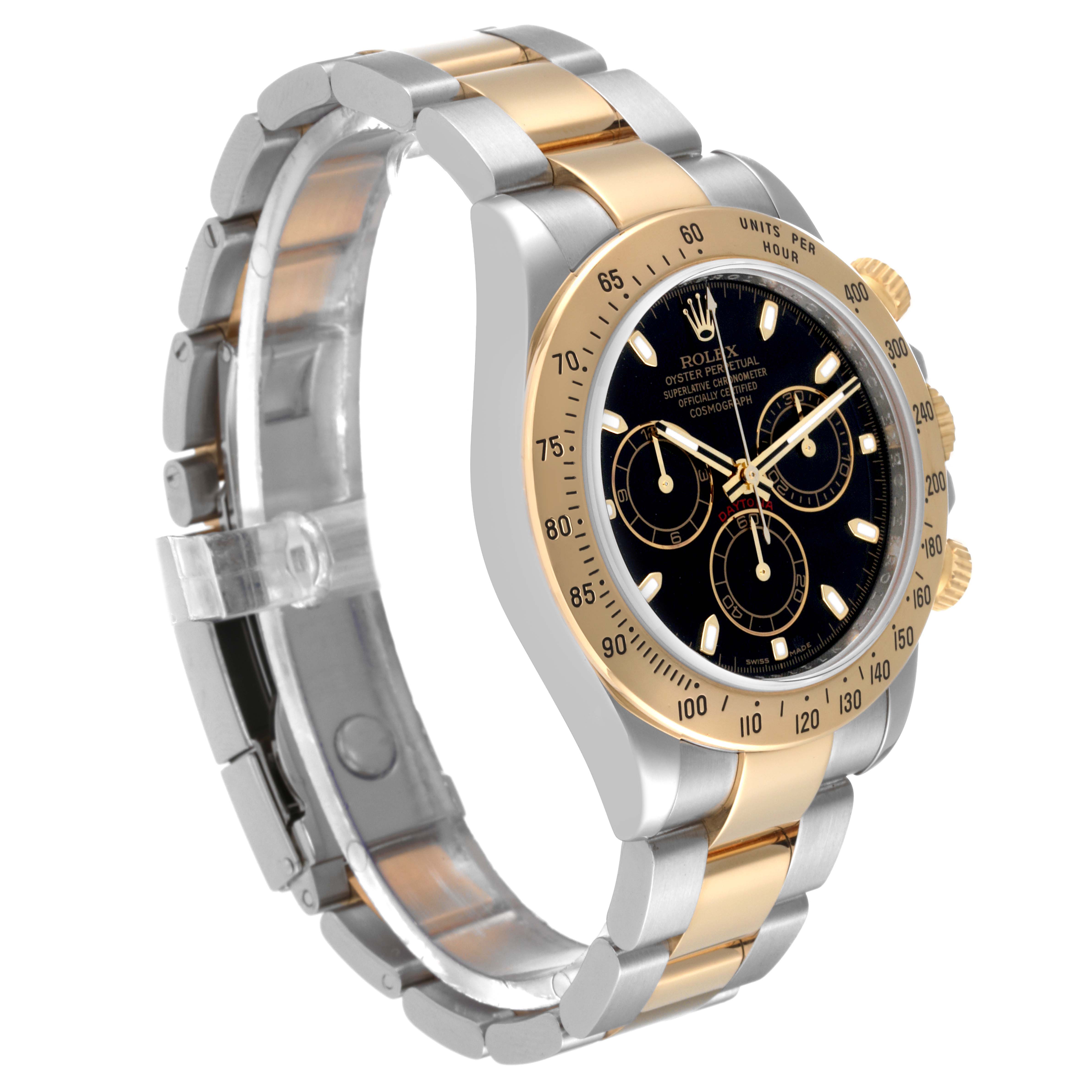 The image shows a Rolex Daytona 116523 Men's Steel and Gold (two tone) Black Dial 116523 Men's Steel and Gold (two tone) Black Dial watch at a slight angle highlighting its black dial, gold bezel, and two-tone bracelet.