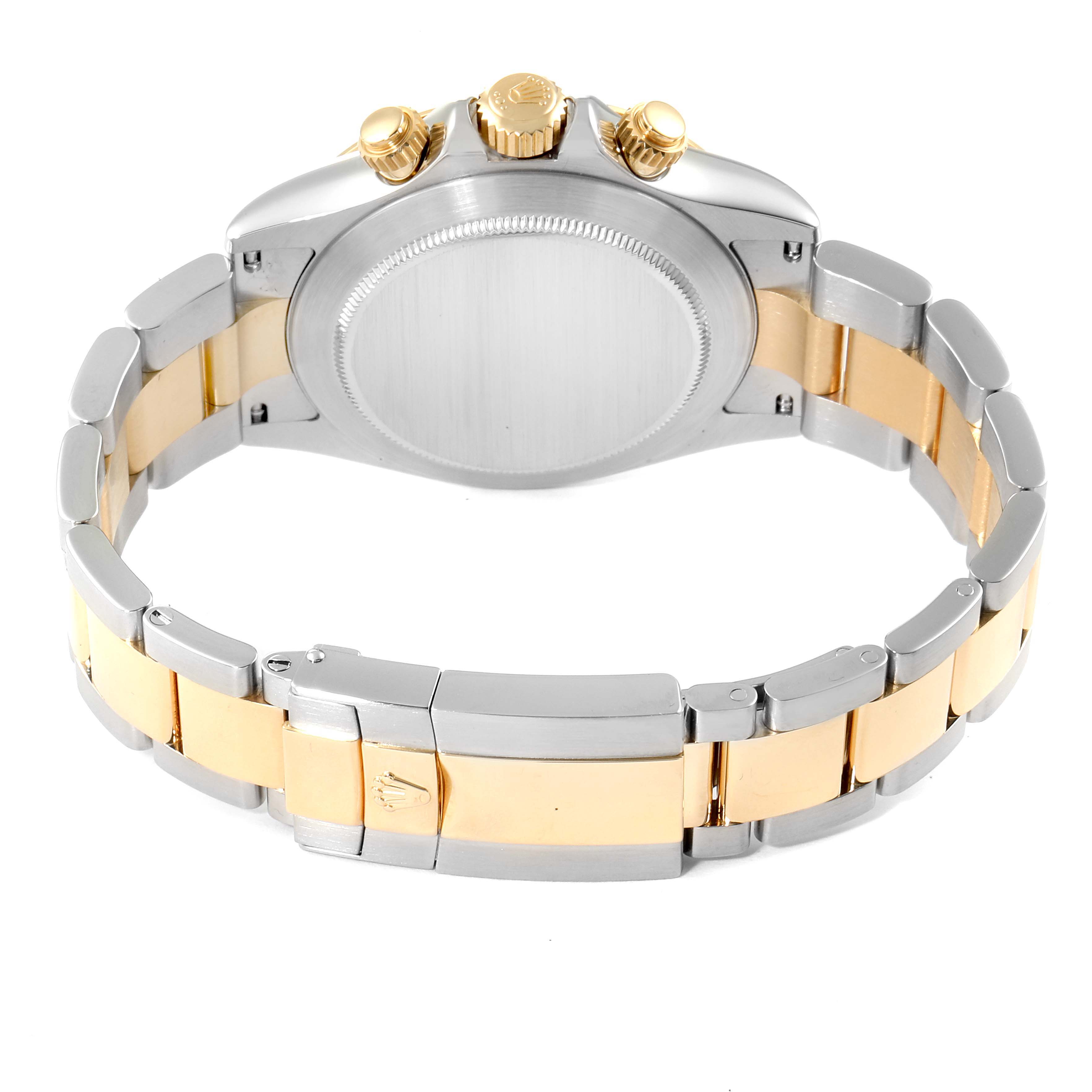 The image shows the back view of a Rolex Daytona 116523 Men's Steel and Gold (two tone) White Dial 116523 Men's Steel and Gold (two tone) White Dial watch, highlighting the bracelet, clasp, and case back.
