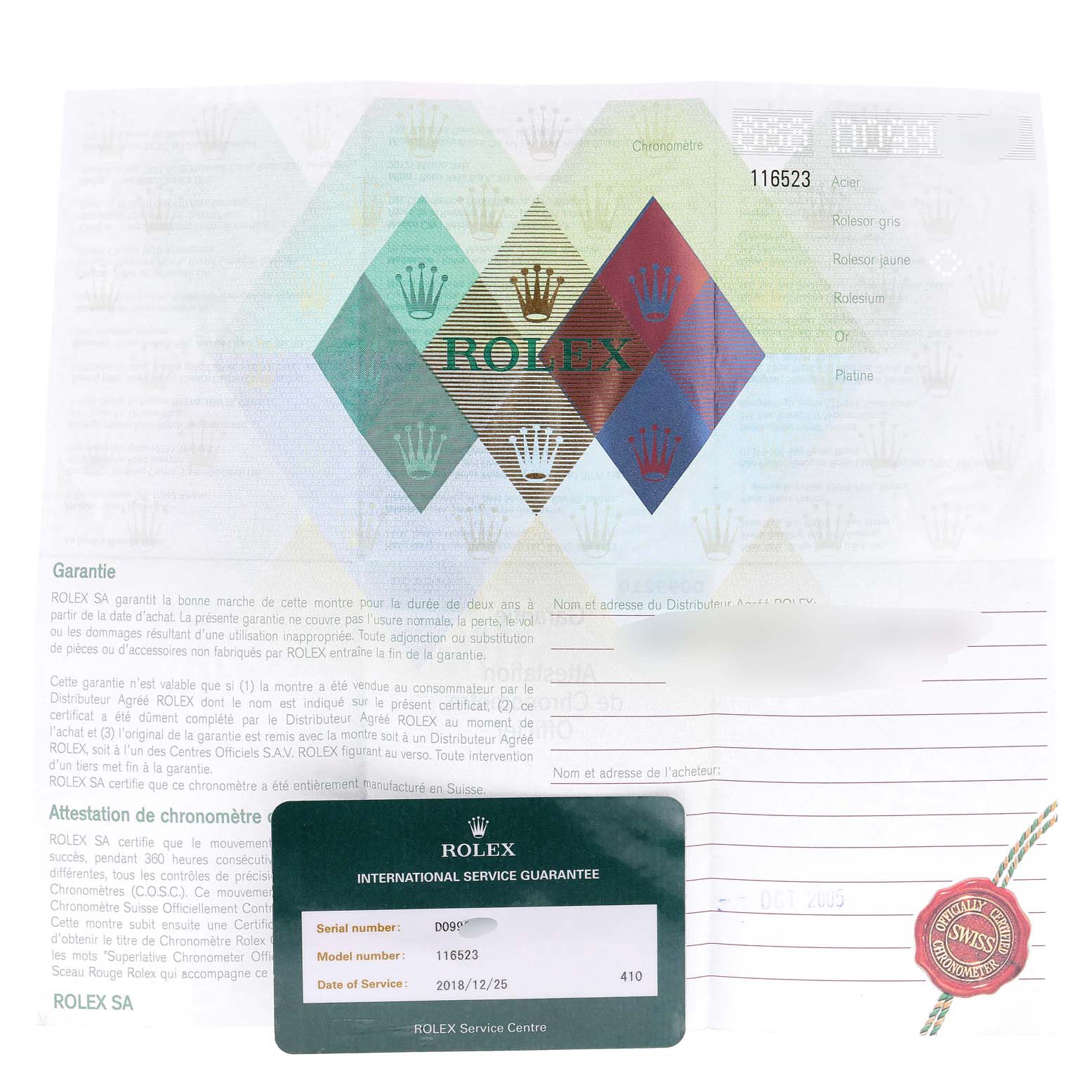 The image shows the international service guarantee card and paperwork for a Rolex Daytona 116523 Men's Steel and Gold (two tone) White Dial 116523 Men's Steel and Gold (two tone) White Dial model, featuring its model number and service date.