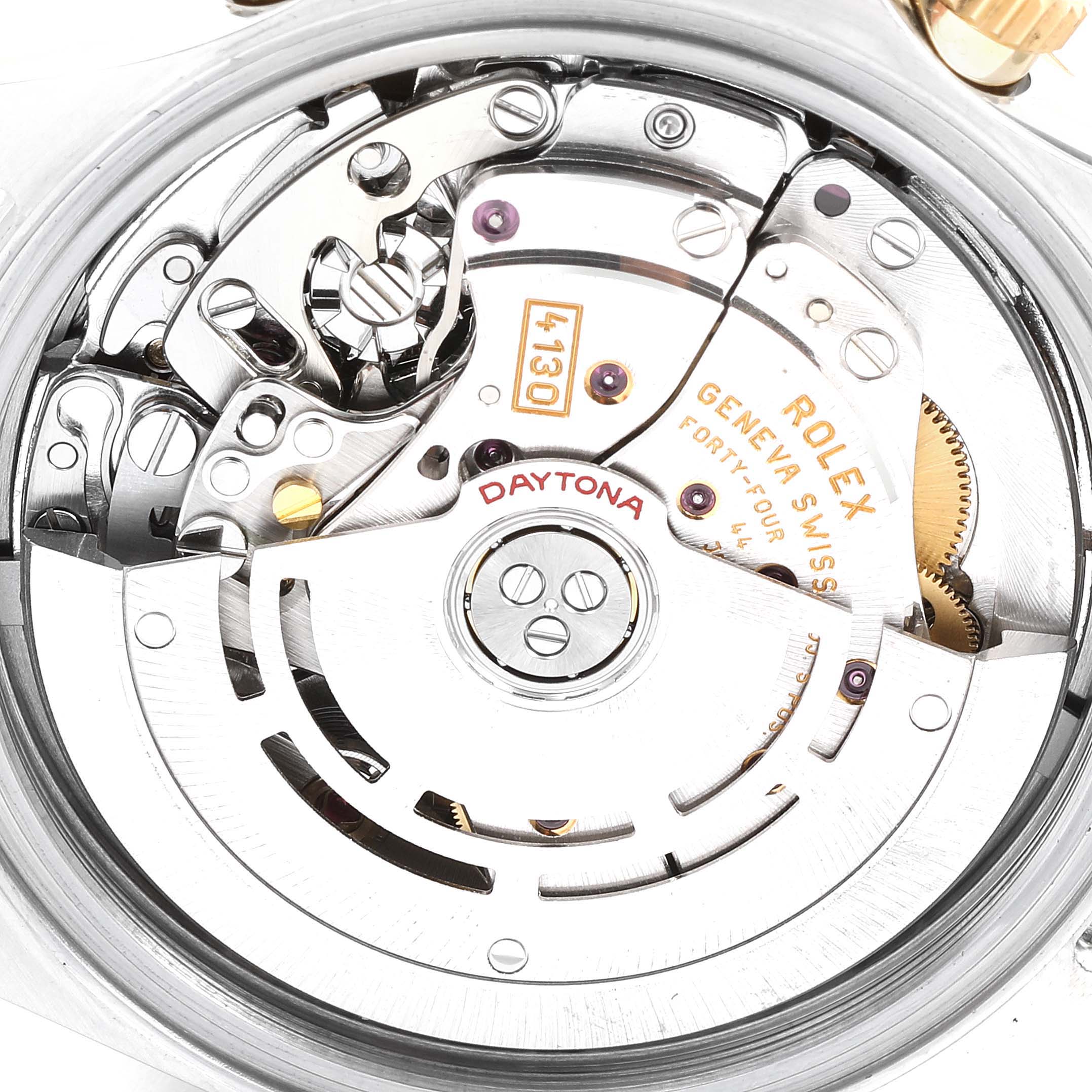 This image shows the internal mechanism of the Rolex Daytona 116523 Men's Steel and Gold (two tone) White Dial 116523 Men's Steel and Gold (two tone) White Dial watch, focusing on its intricate components and engravings.
