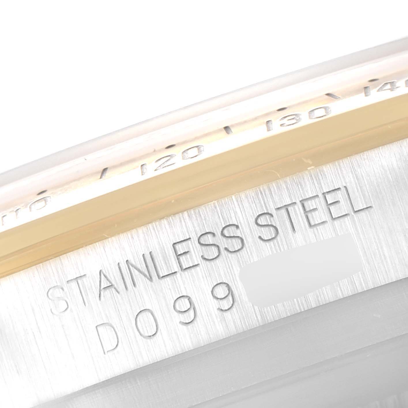 The image shows a close-up angle of the stainless steel casing and part of the bezel of a Rolex Daytona 116523 Men's Steel and Gold (two tone) White Dial 116523 Men's Steel and Gold (two tone) White Dial watch.