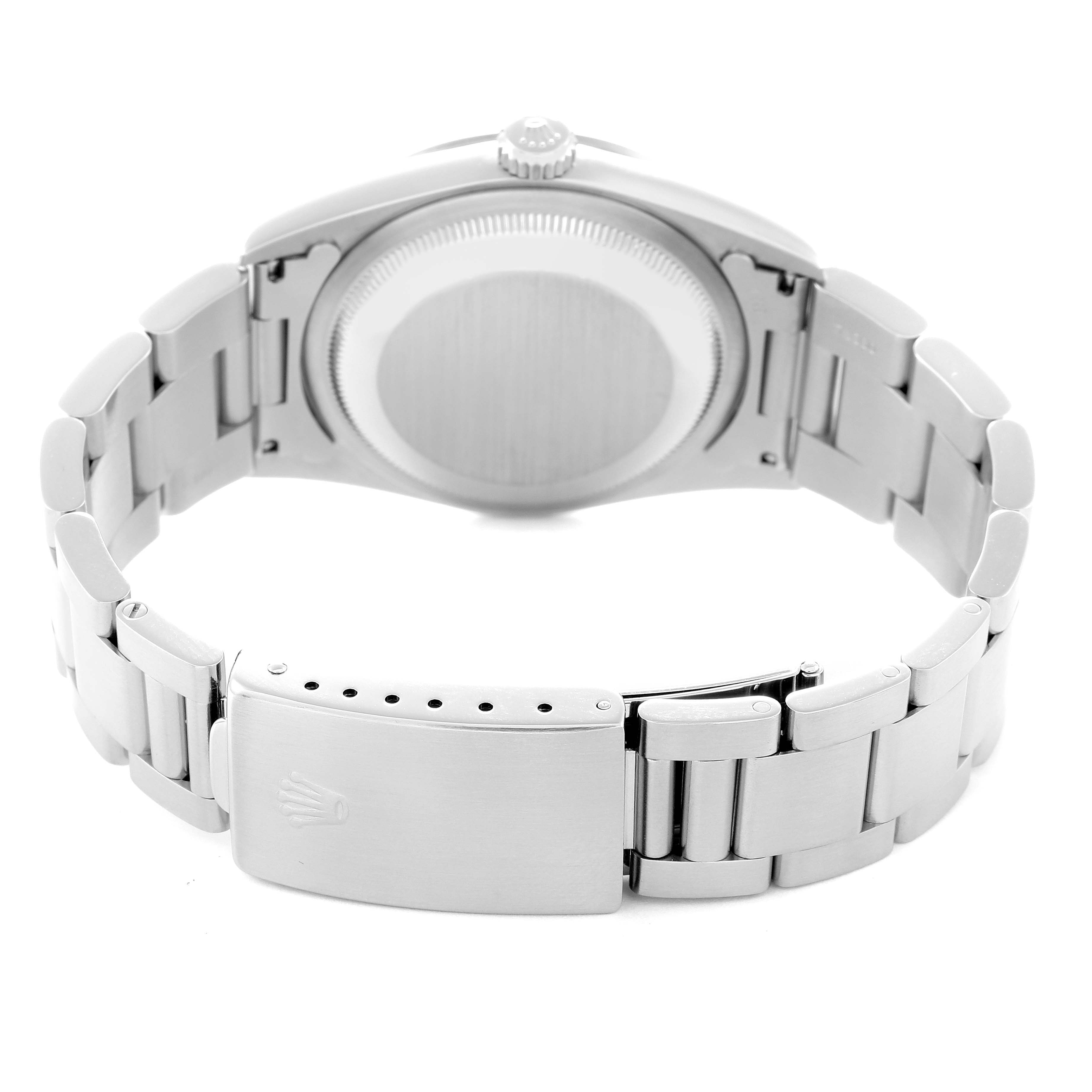 The image shows the Rolex Explorer model 14270 from the back, featuring the closed clasp, case back, and part of the bracelet.