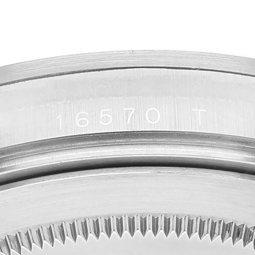 The image shows a close-up of the model number and bezel edge of a Rolex Explorer 16570 Men
s Stainless Steel Black Dial 16570 Men
s Stainless Steel Black Dial watch.