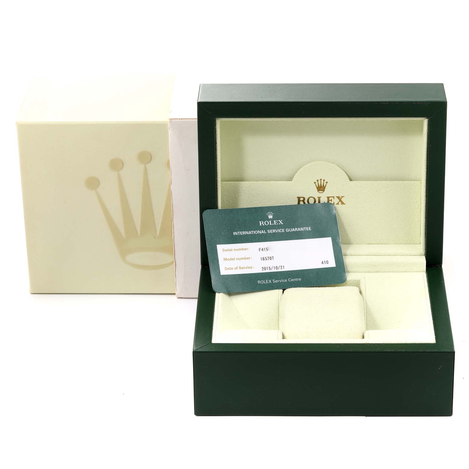 The image shows the opened box and international service guarantee card for a Rolex Explorer 16570 Men
s Stainless Steel Black Dial 16570 Men
s Stainless Steel Black Dial watch.