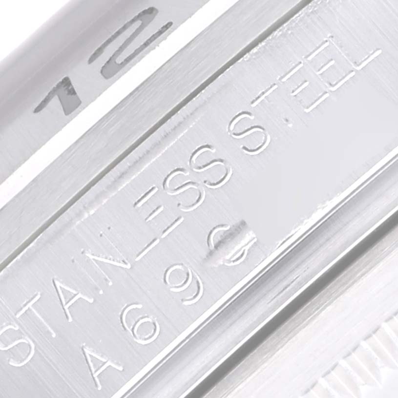 Close-up view of the side of a Rolex Explorer 16570 Men
s Stainless Steel Black Dial 16570 Men
s Stainless Steel Black Dial watch case, showing the stainless steel engraving.