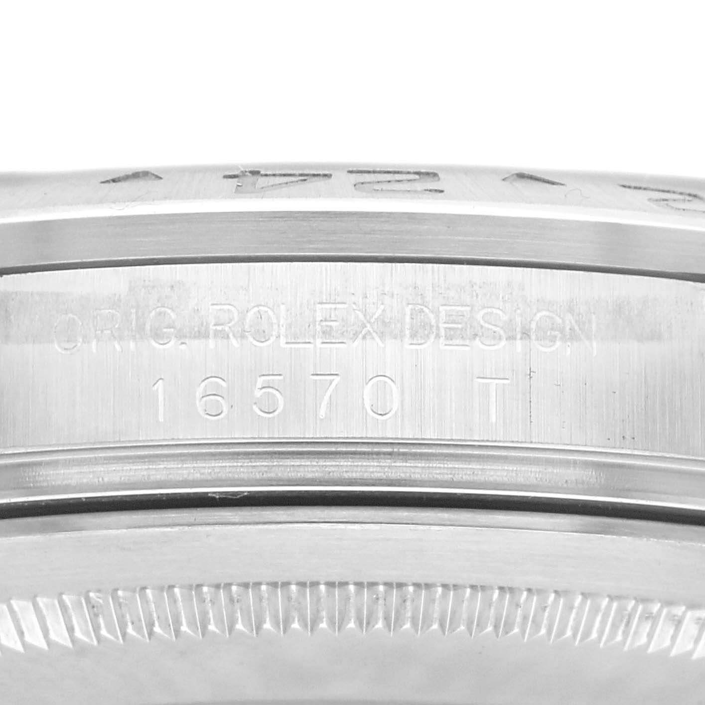 The image shows a close-up of the side of the Rolex Explorer model, model number 16570, displaying its engraved design and serial details.